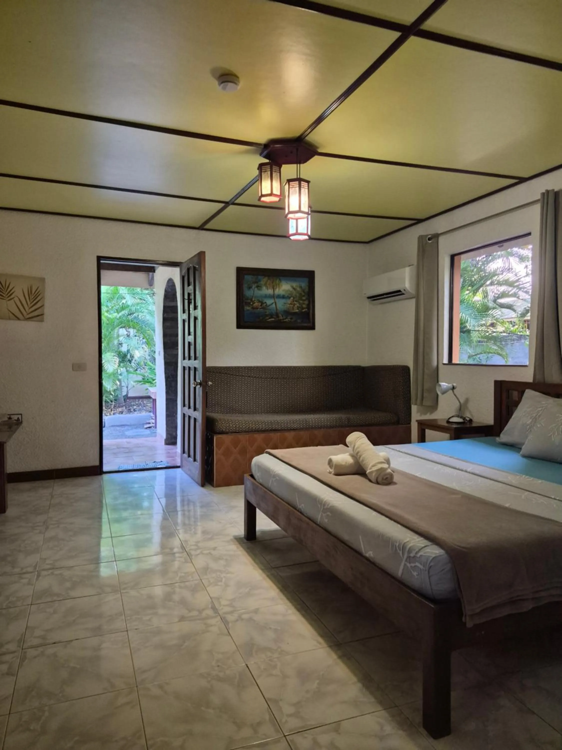 Bed in ALONALAND RESORT