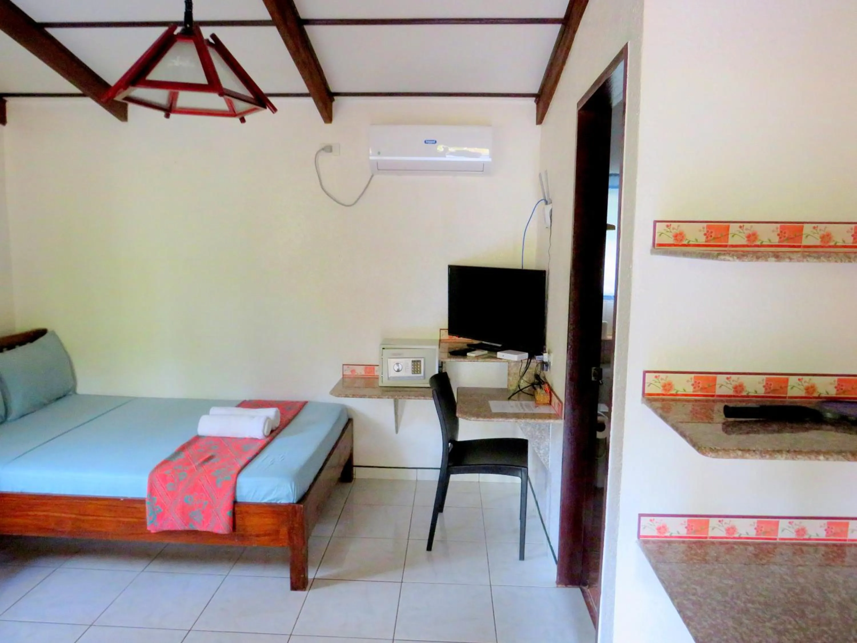 Bed in ALONALAND RESORT