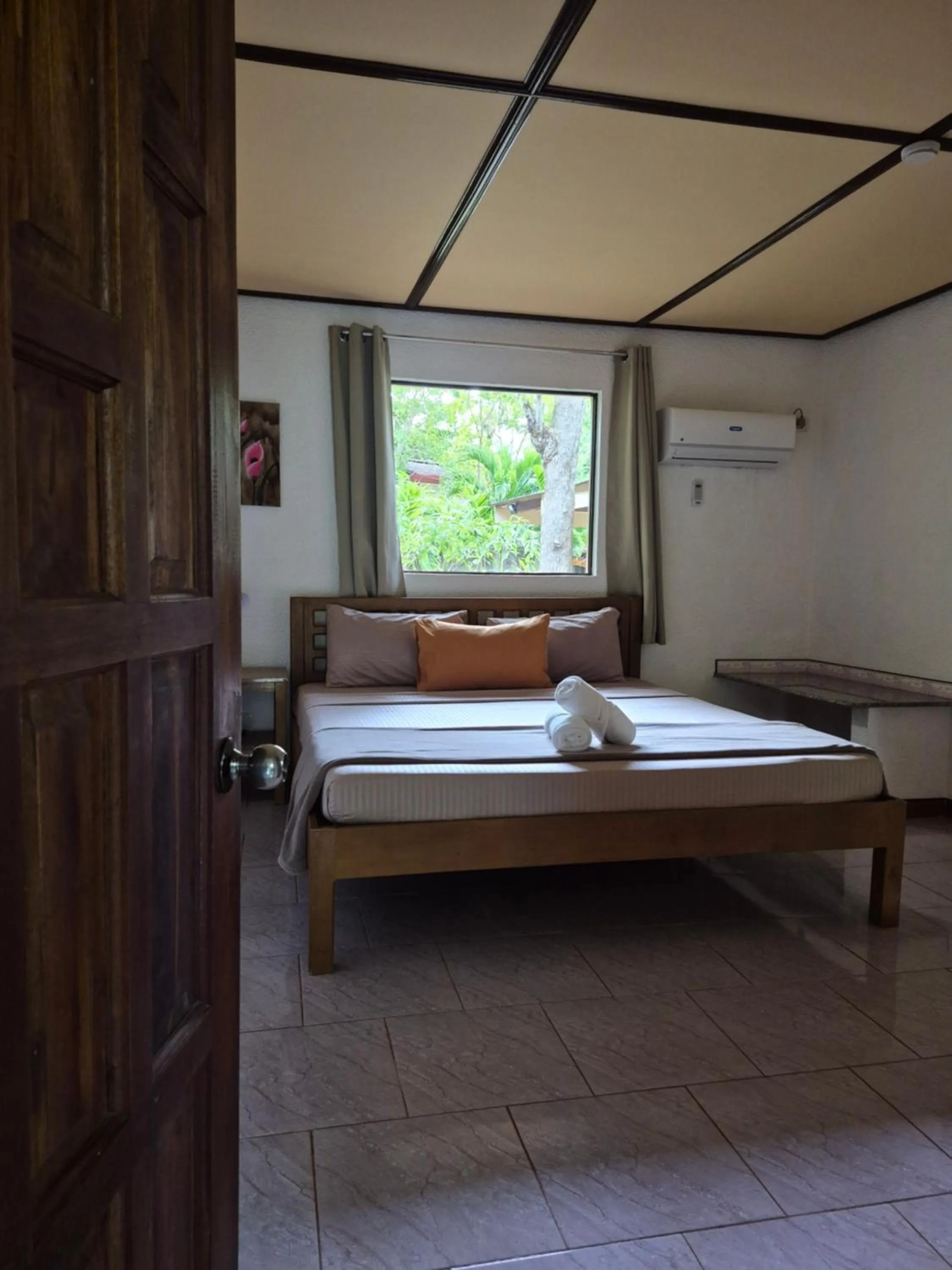 Bed in ALONALAND RESORT