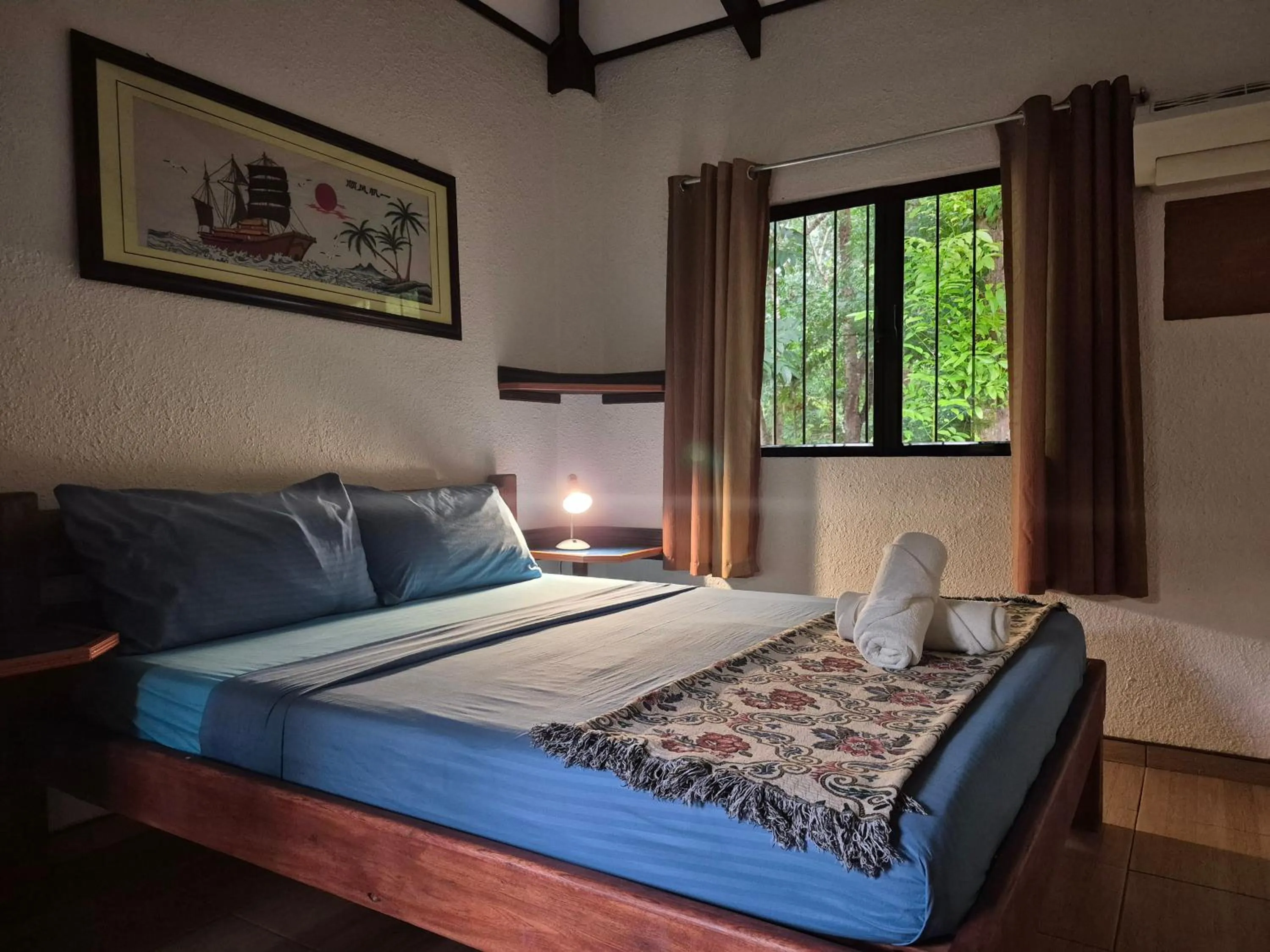 Bed in ALONALAND RESORT