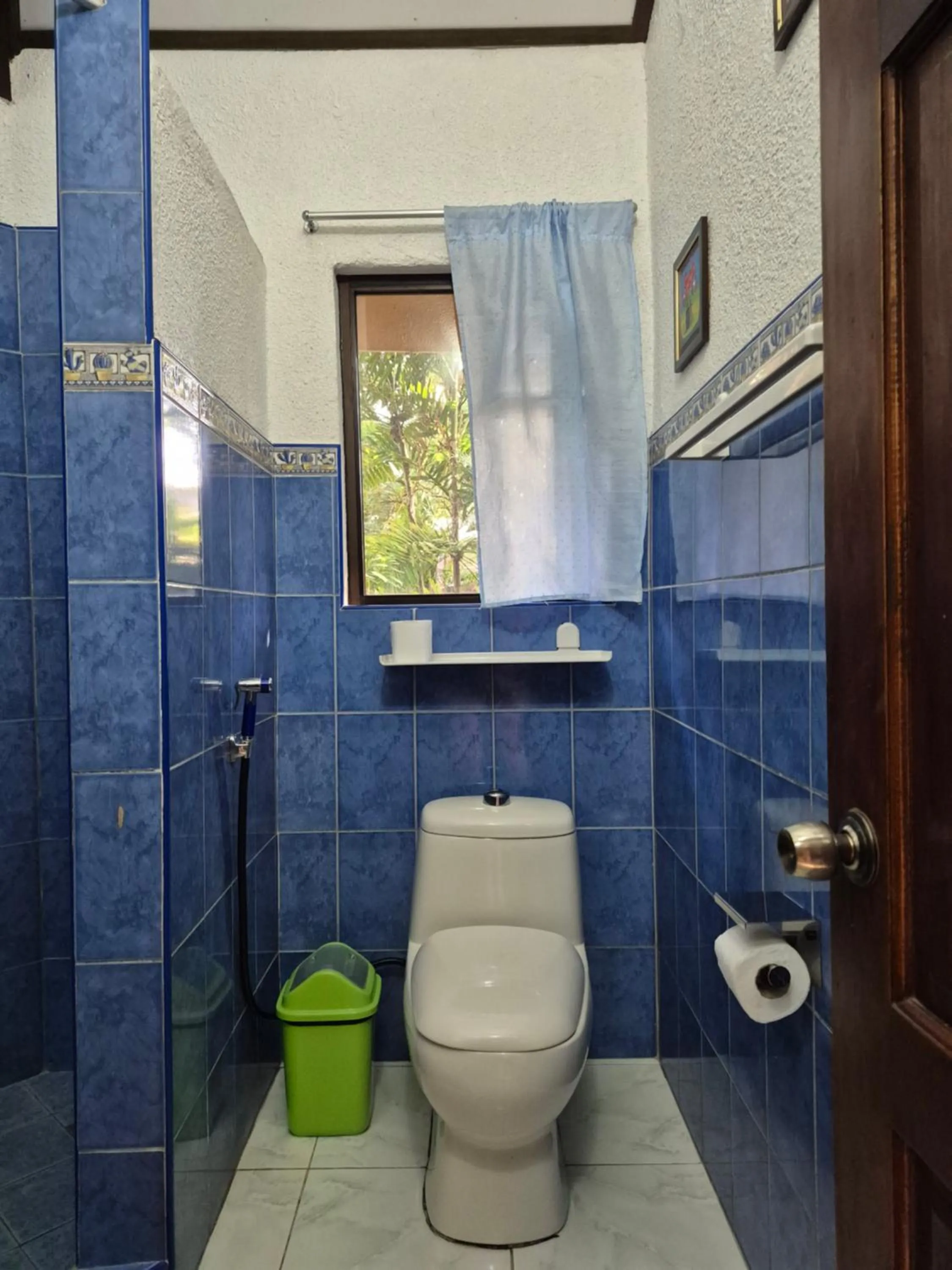 Toilet in ALONALAND RESORT