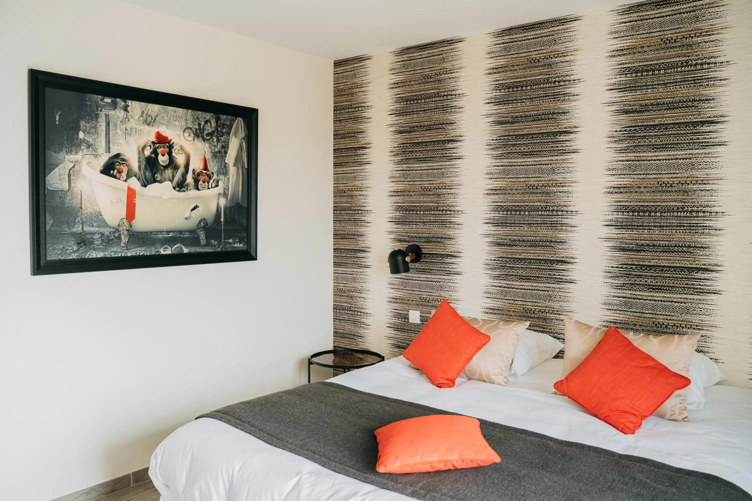 Bed in Hôtel Les Agapanthes-Logis Hôtel