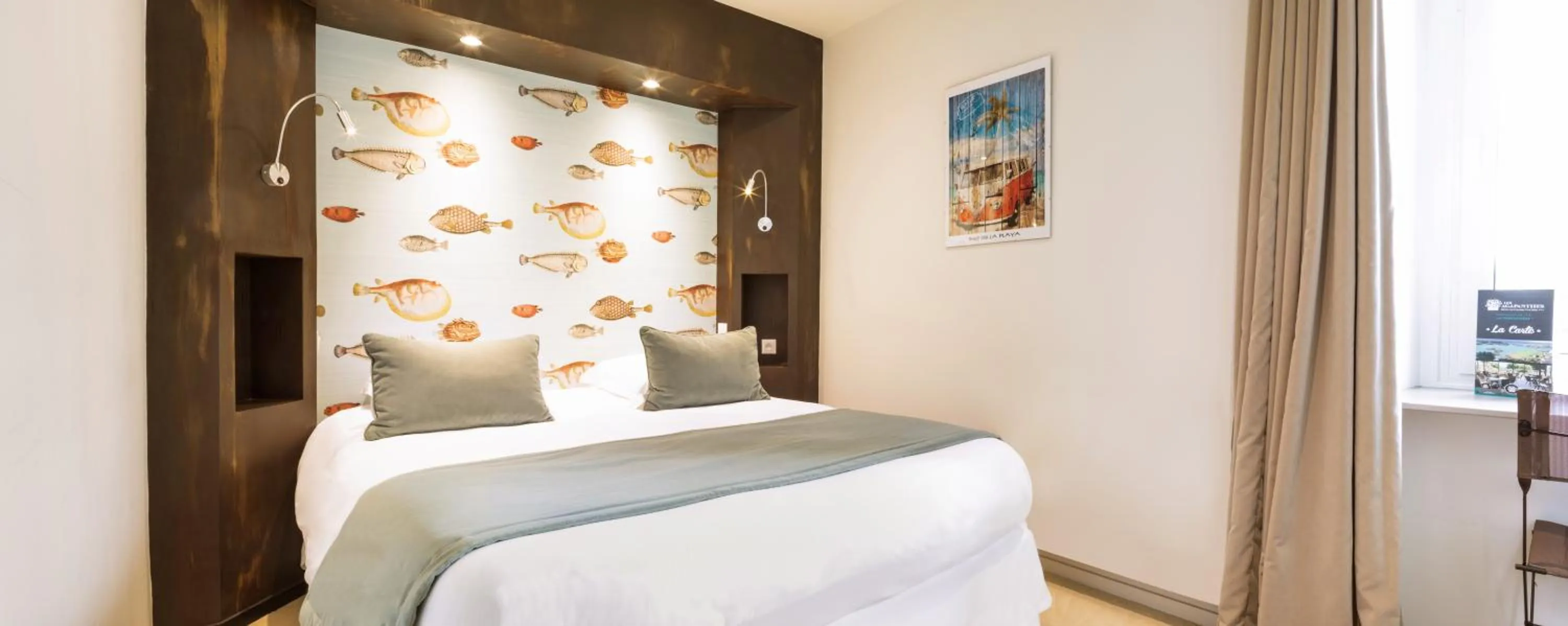 Bed in Hôtel Les Agapanthes-Logis Hôtel