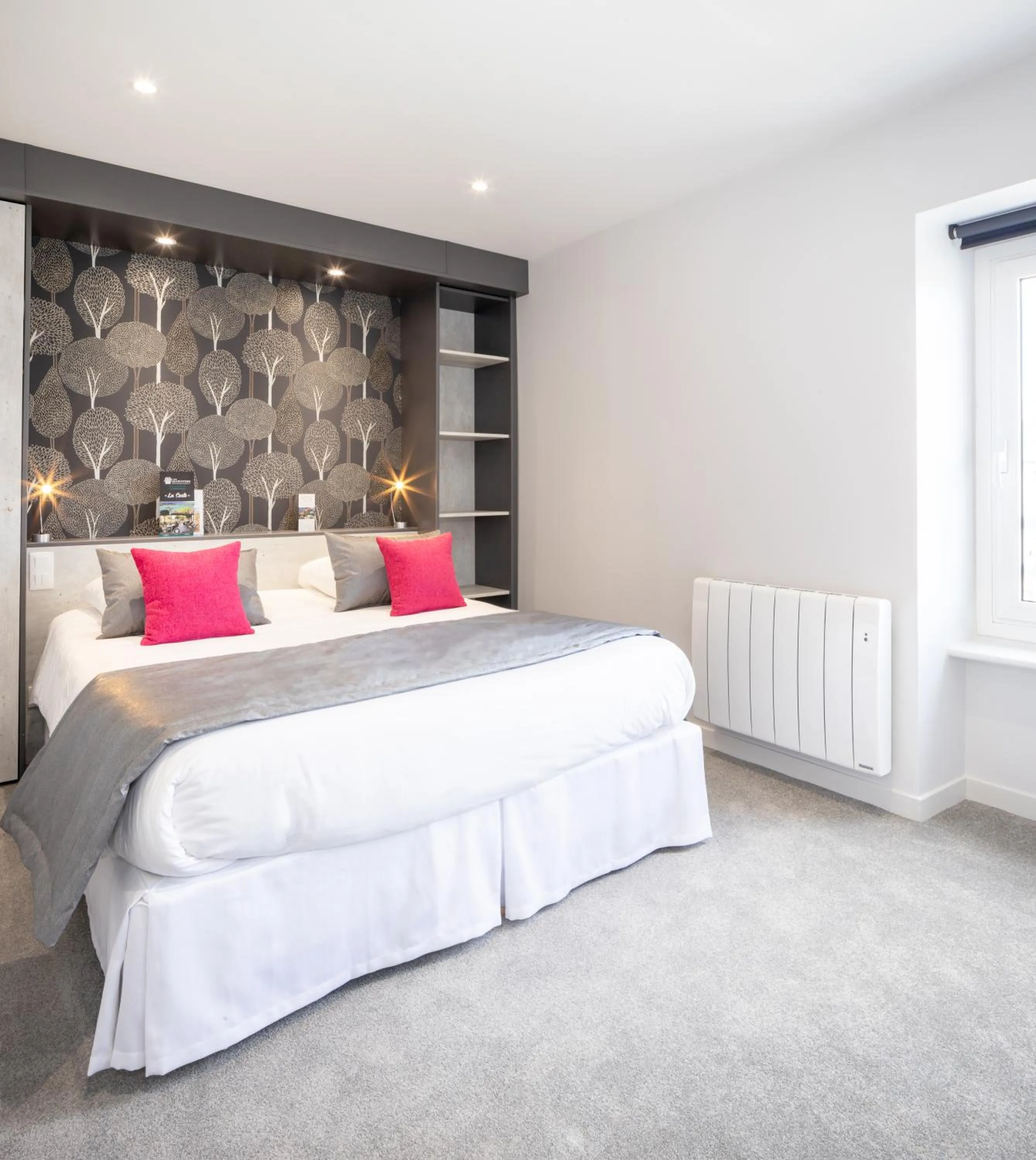 Bed in Hôtel Les Agapanthes-Logis Hôtel