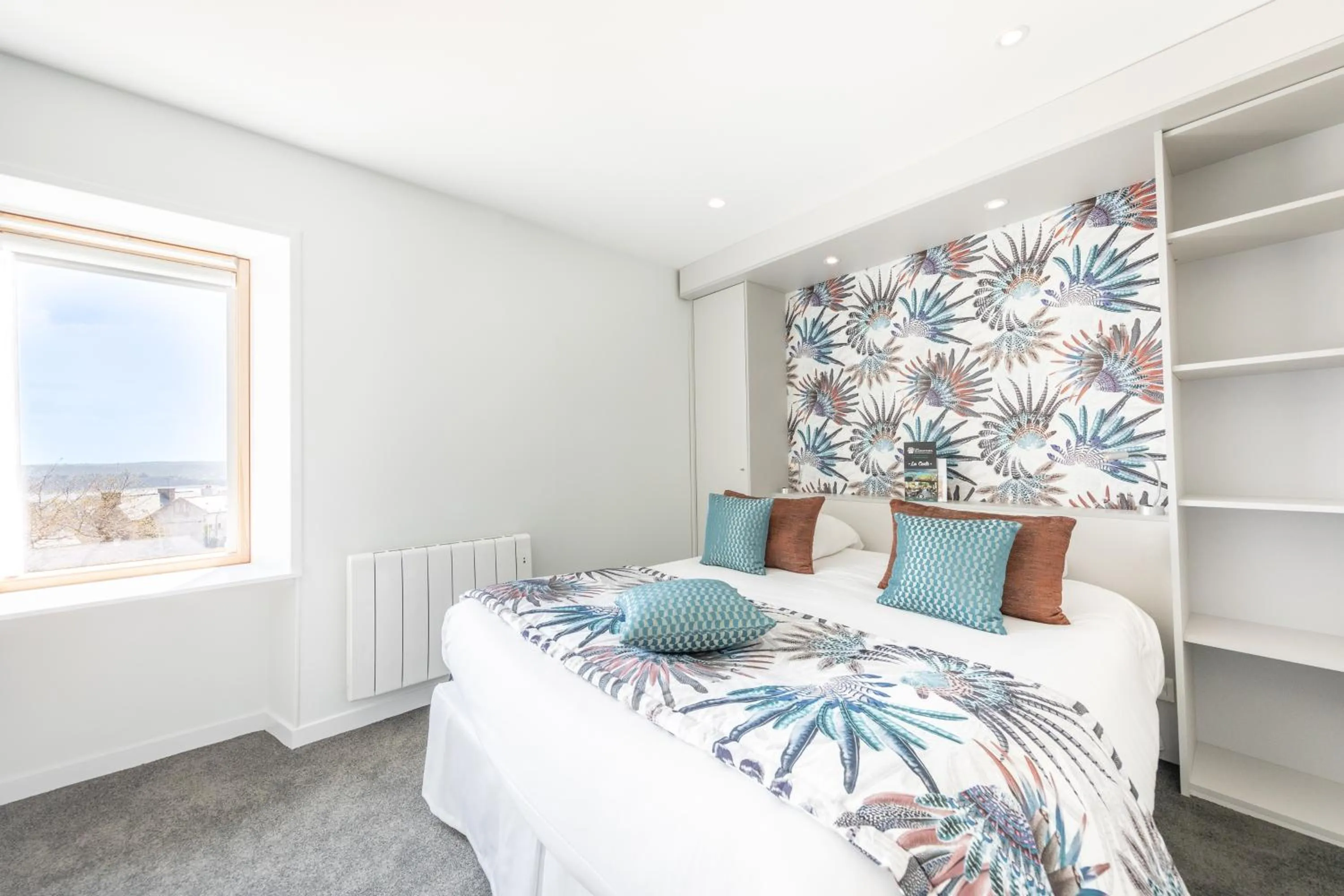 Bed in Hôtel Les Agapanthes-Logis Hôtel