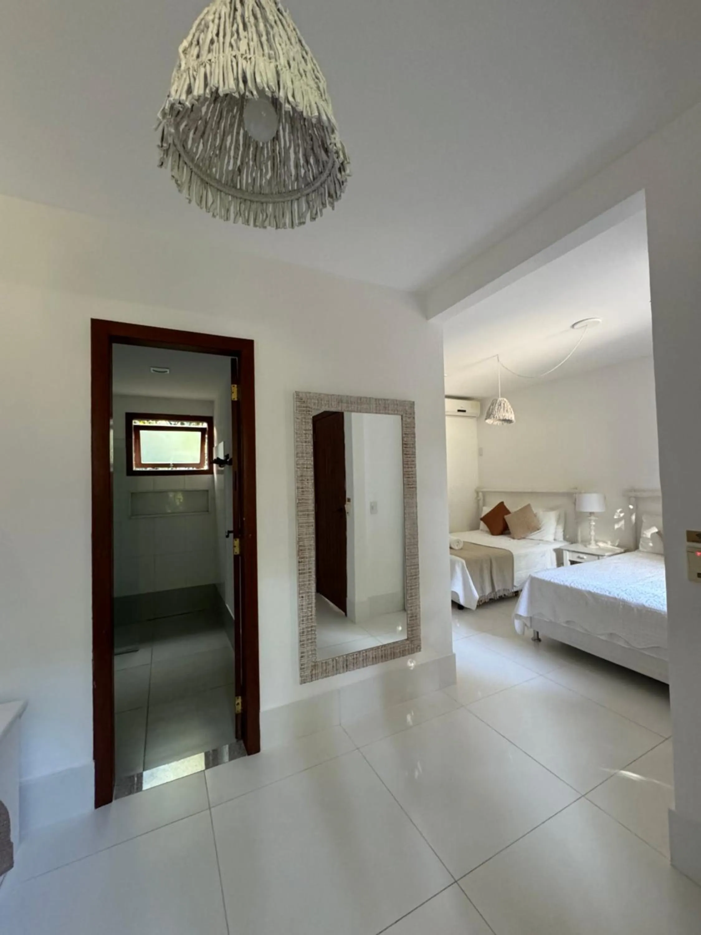 Photo of the whole room, Bed in Pousada Coisa e Tao