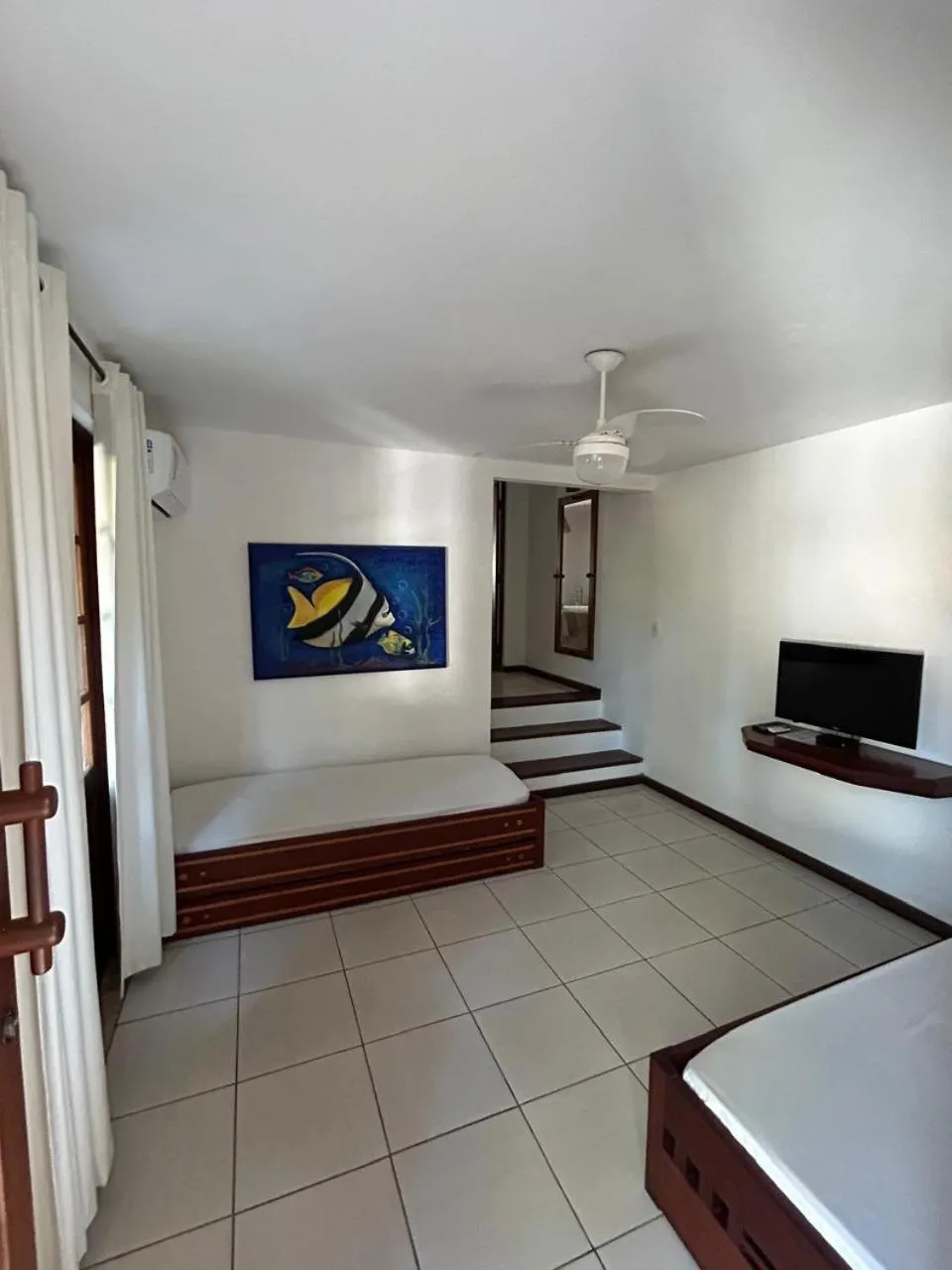 Bed in Pousada Coisa e Tao