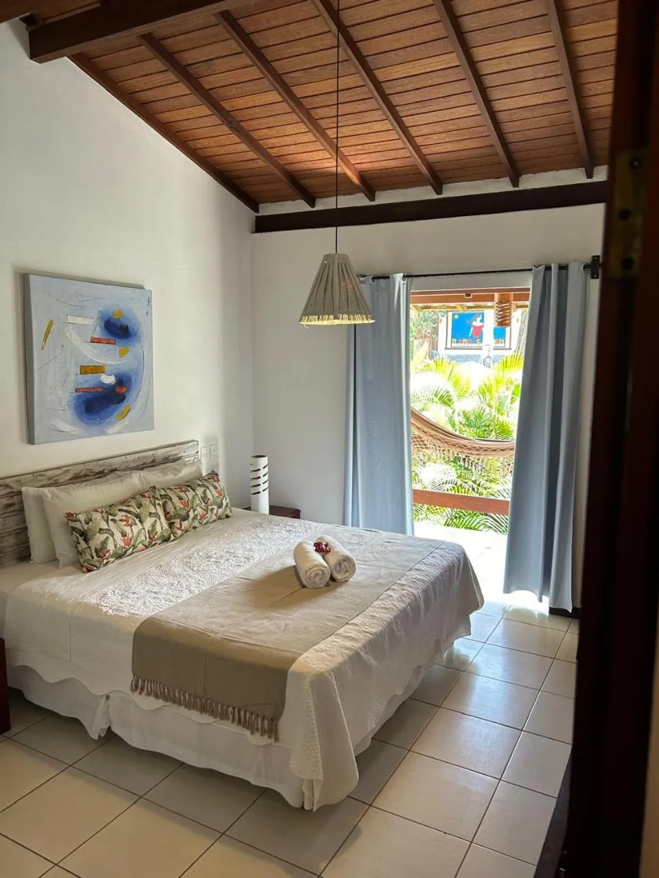 Bed in Pousada Coisa e Tao