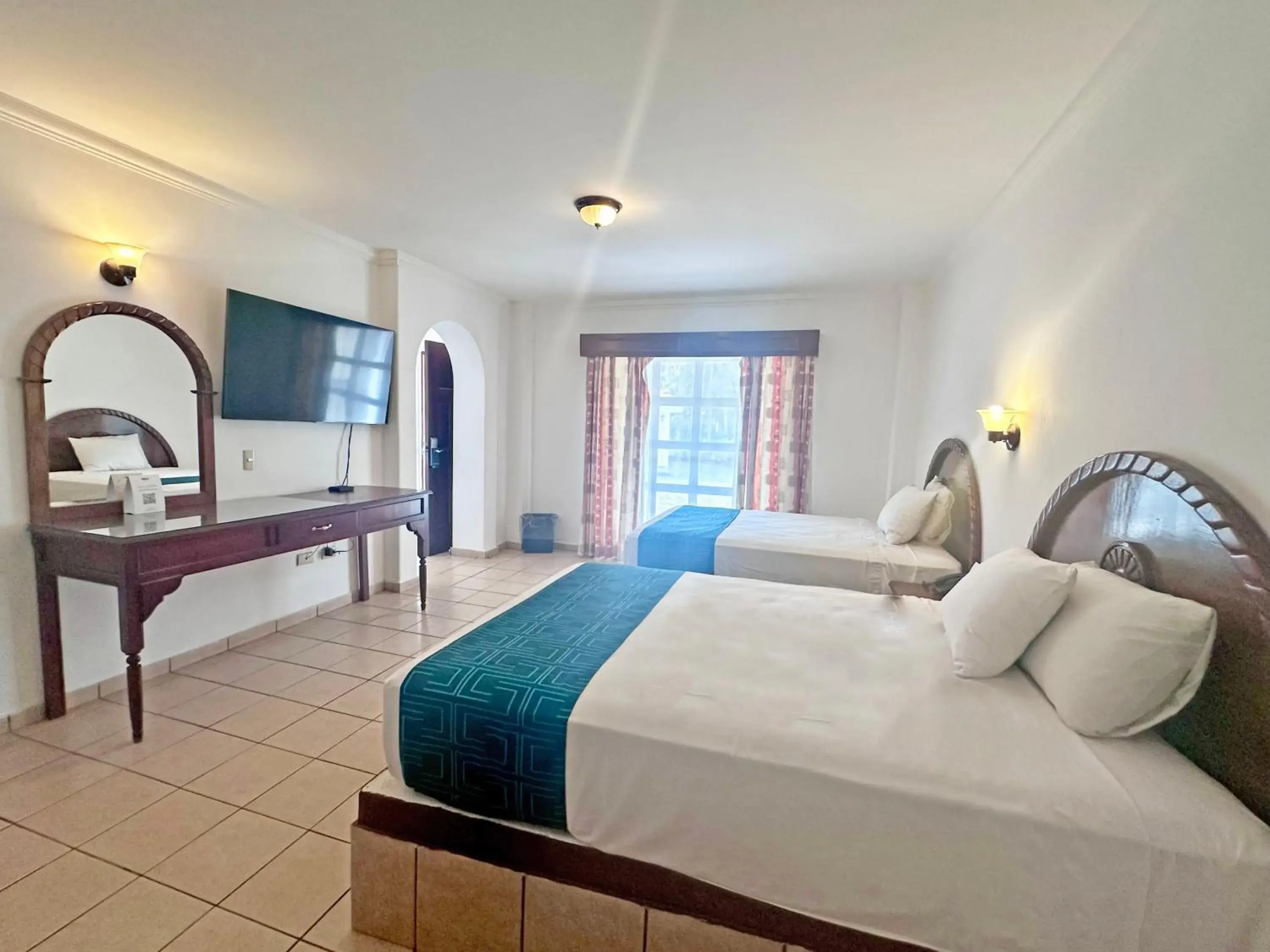 Deluxe Double Room with Two Double Beds in InHouse Select Hacienda Tres Rios Hotel Culiacán Deluxe Double Room with Two Double Beds in InHouse Select Hacienda Tres Rios Hotel Culiacán
