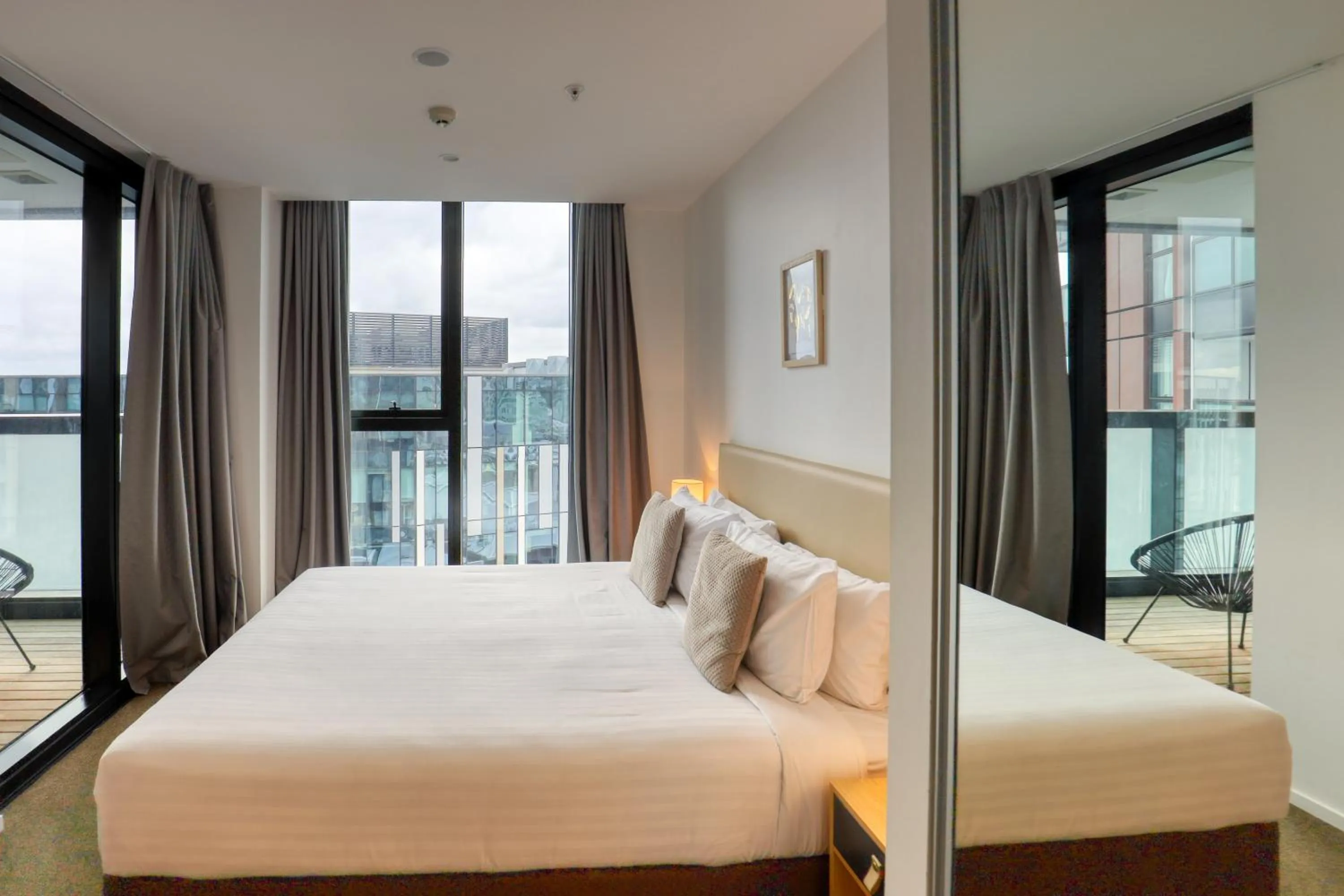 Bedroom, Bed in Ramada Suites By Wyndham Victoria Street West