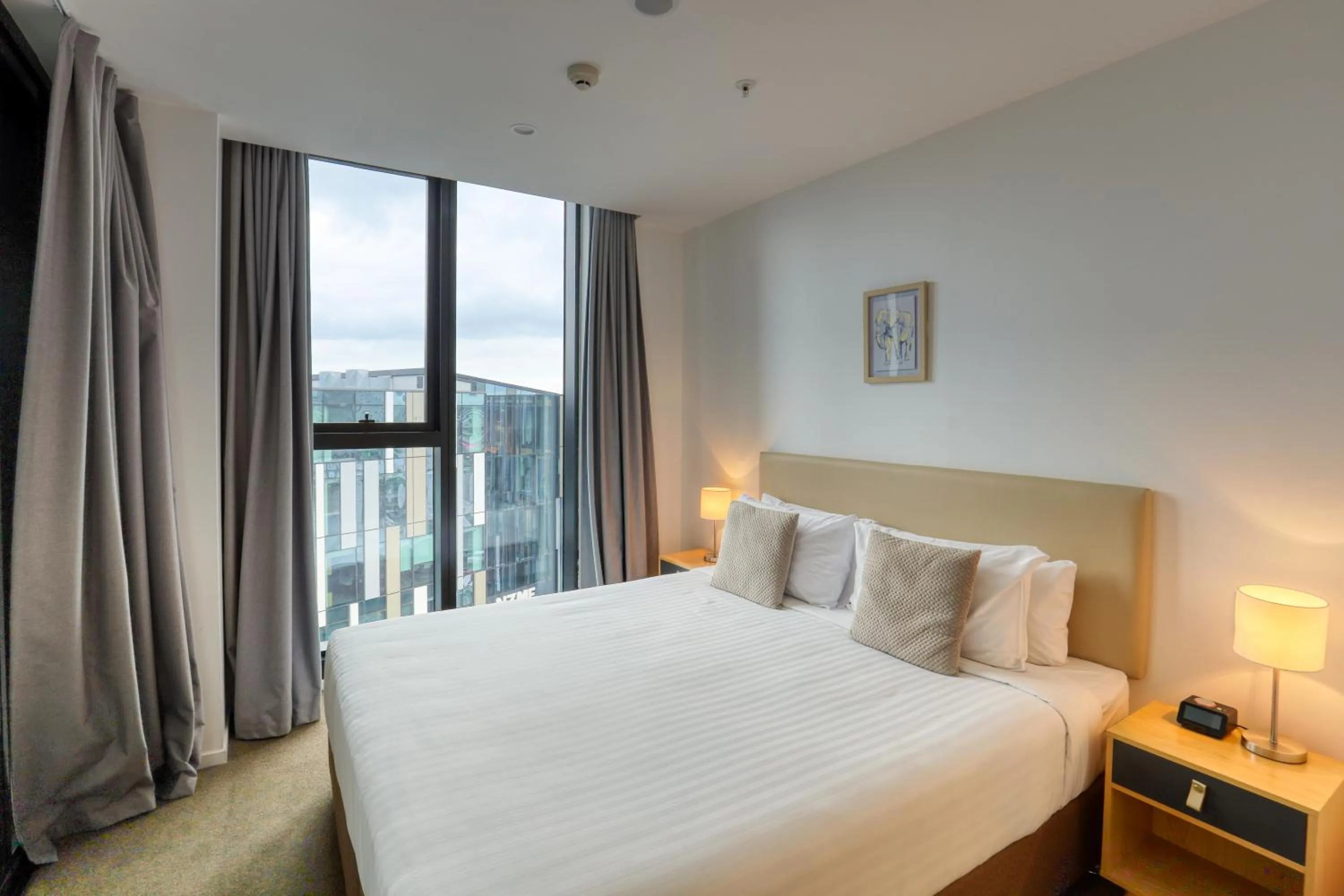 Bed in Ramada Suites By Wyndham Victoria Street West