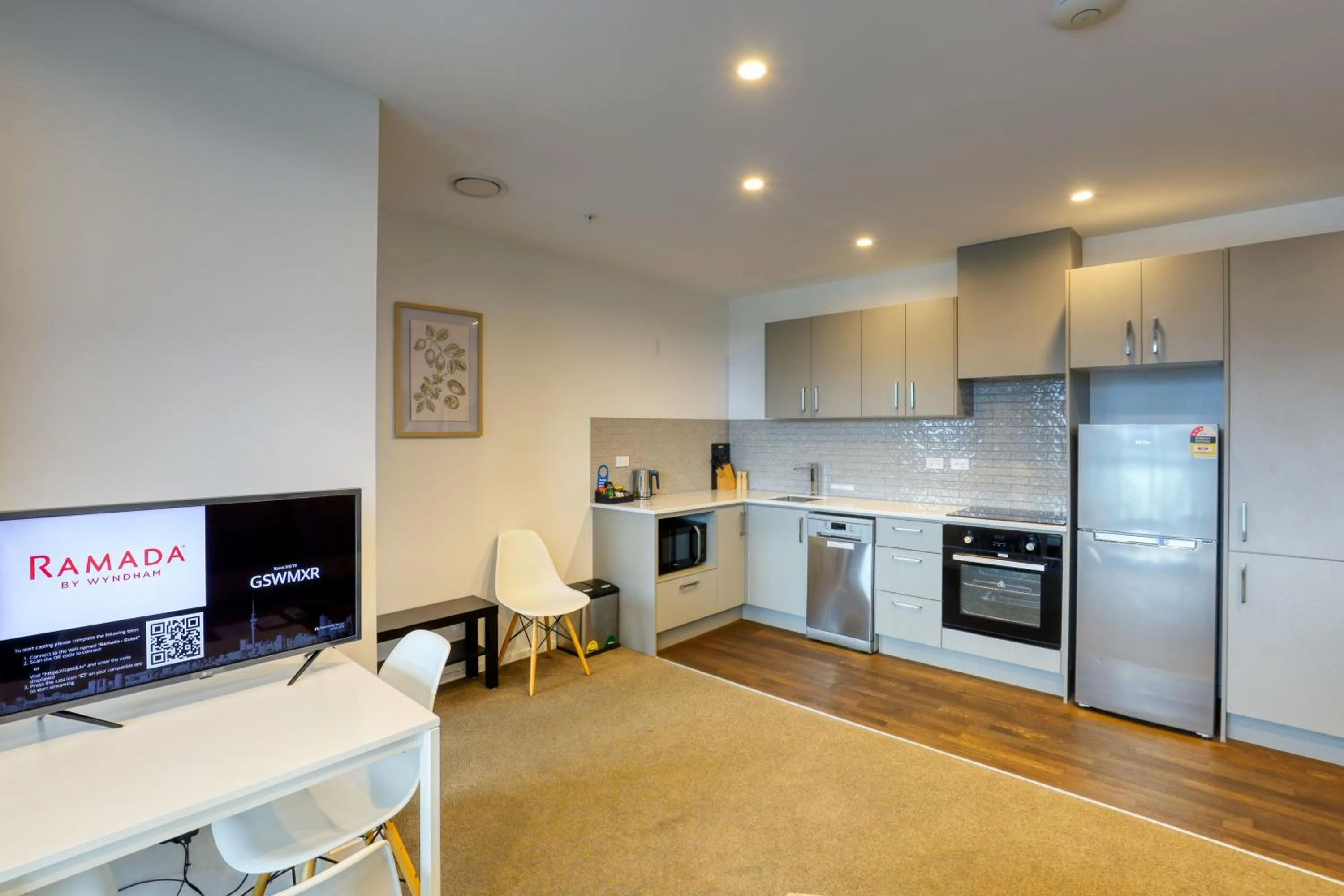 kitchen in Ramada Suites By Wyndham Victoria Street West