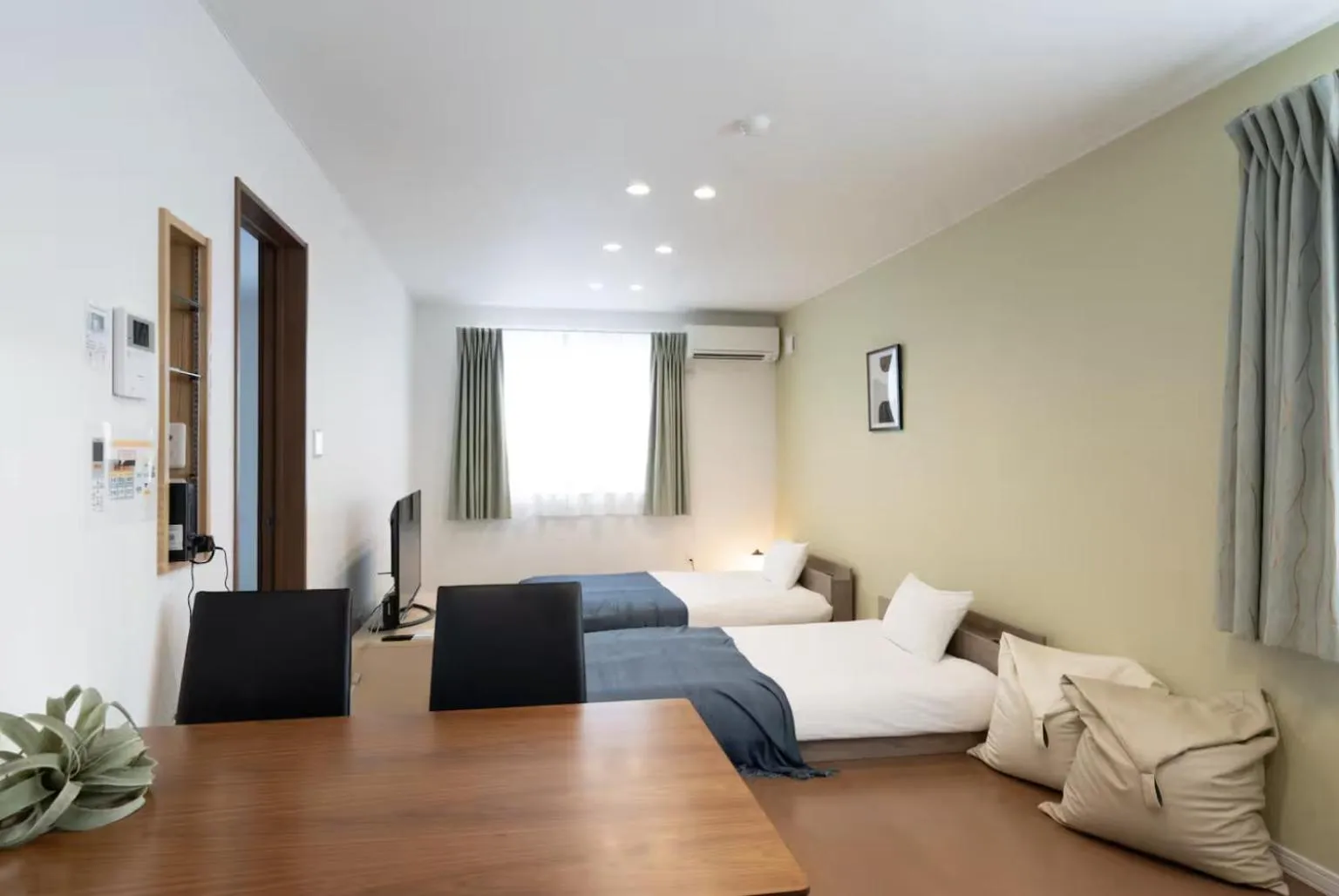 Dining area, Bed in The Peak Villa Suite Hokkaido