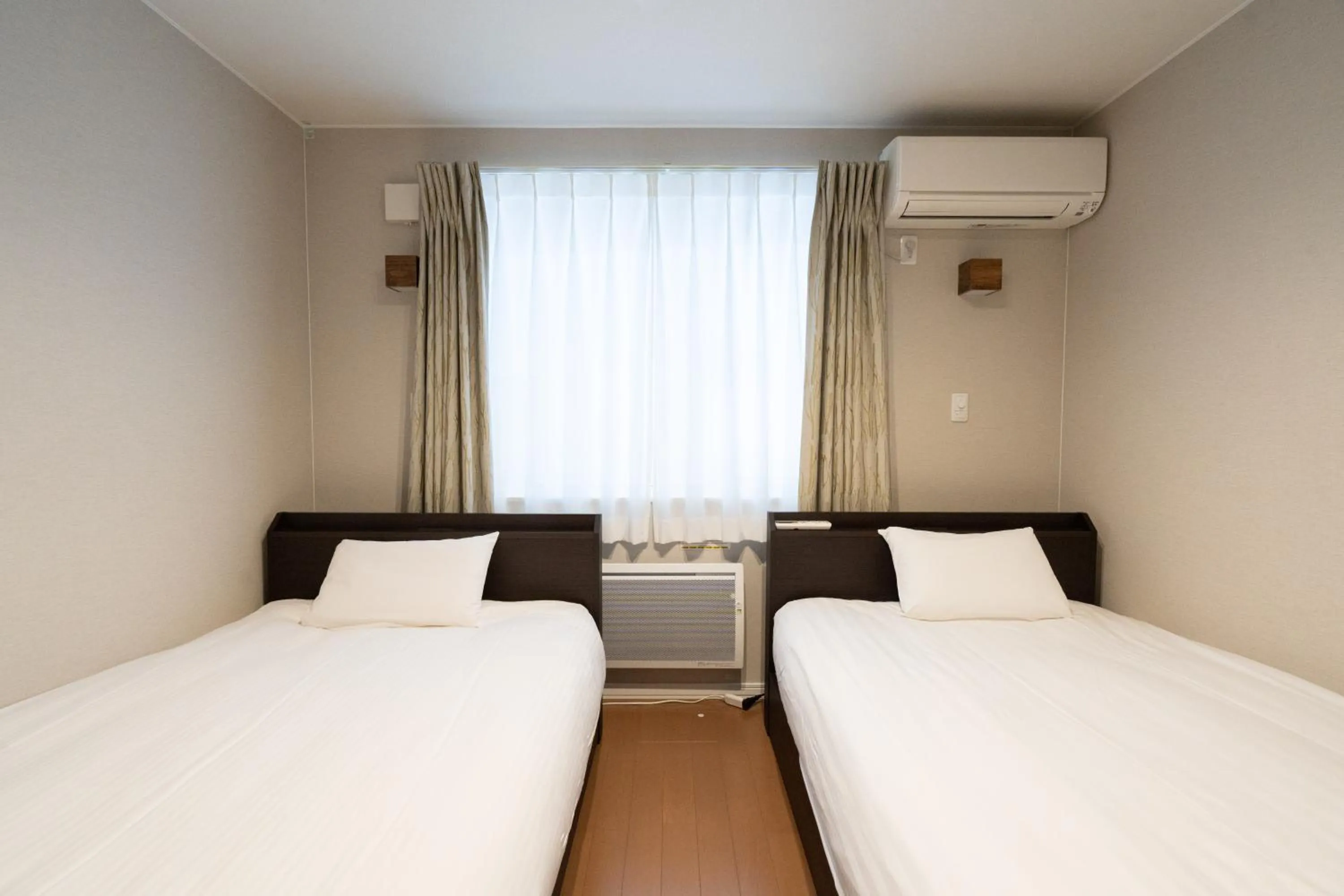 Bed in The Peak Villa Suite Hokkaido