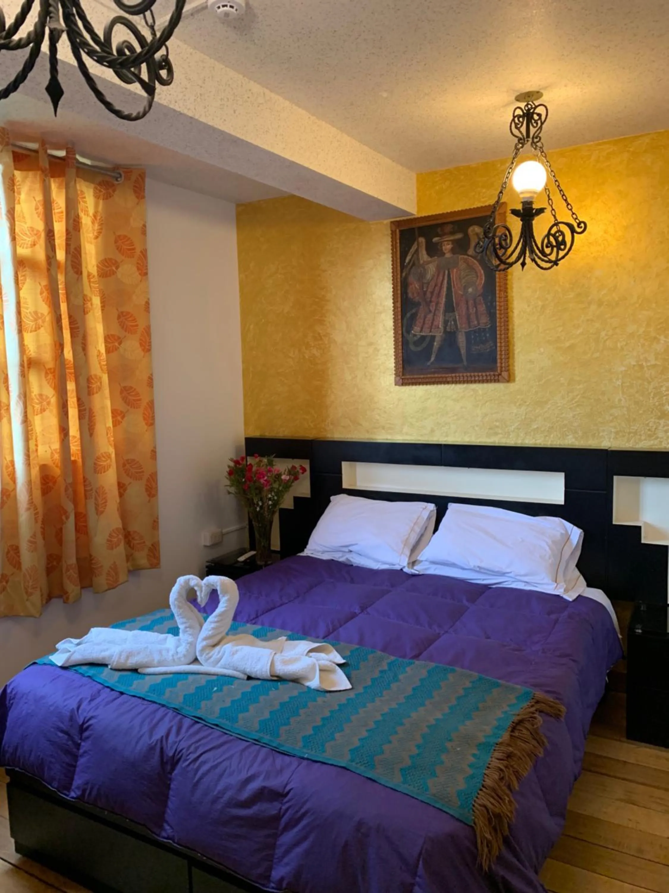 Photo of the whole room, Bed in Hostal Qolqampata