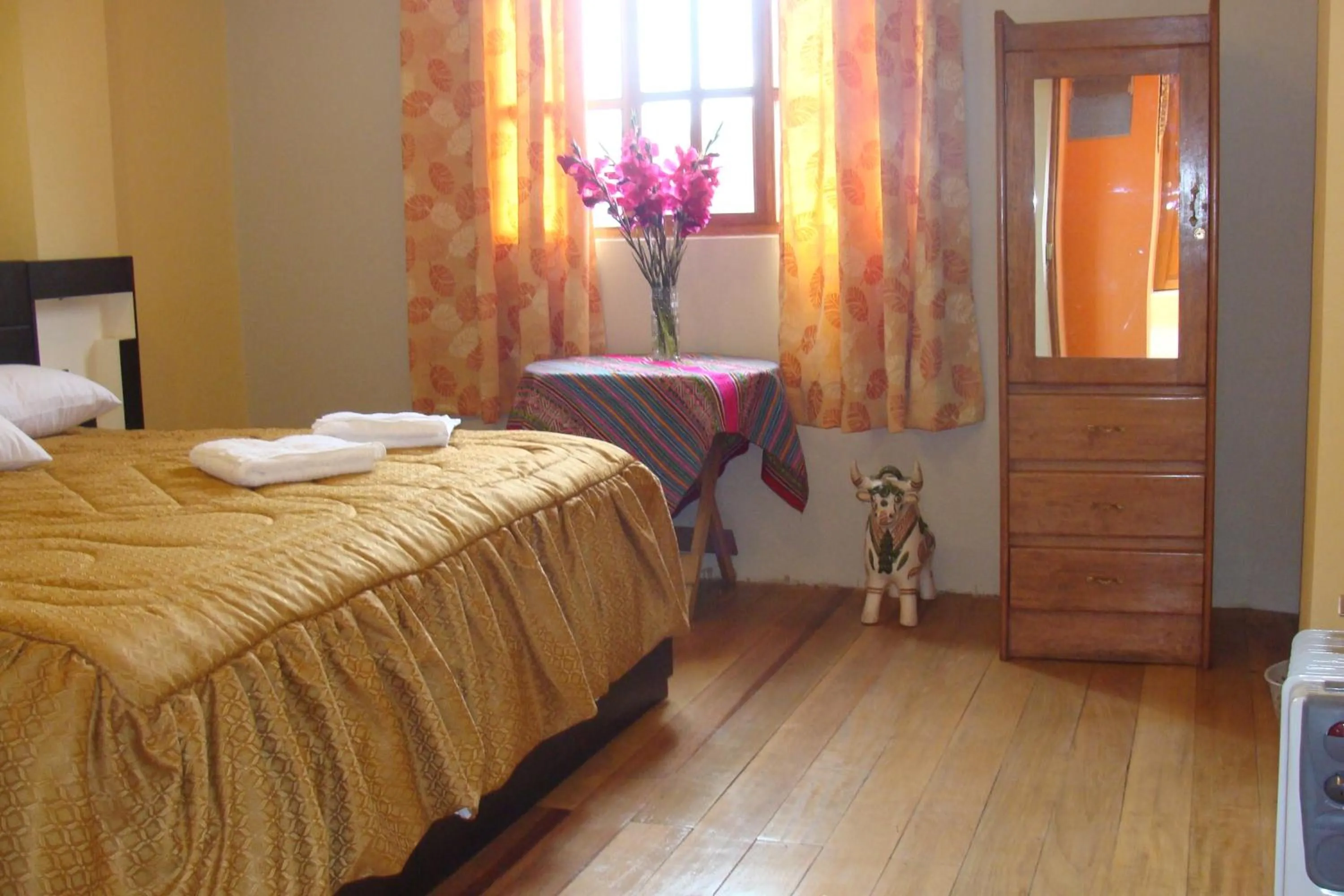 Bed in Hostal Qolqampata