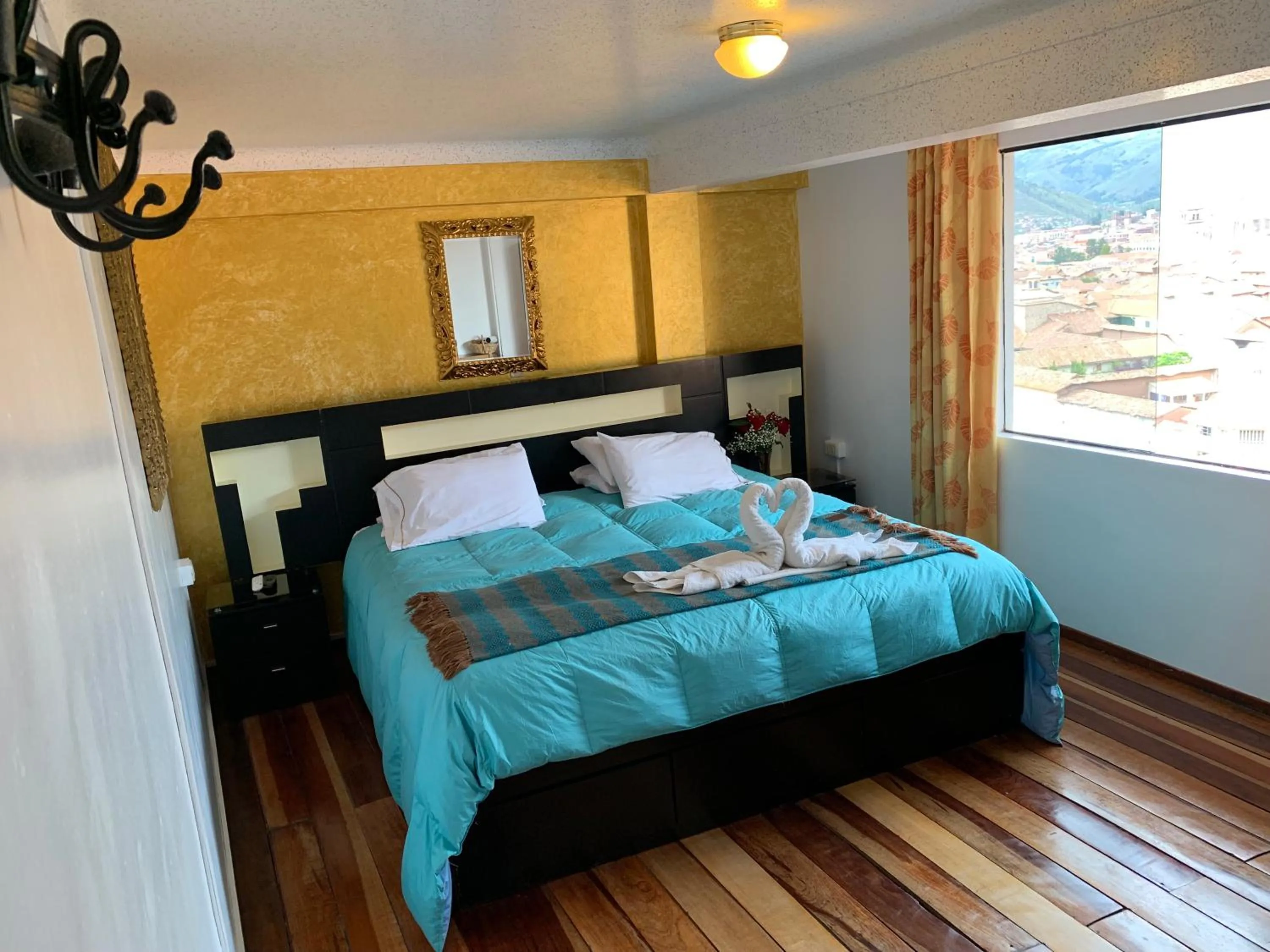 Photo of the whole room, Bed in Hostal Qolqampata