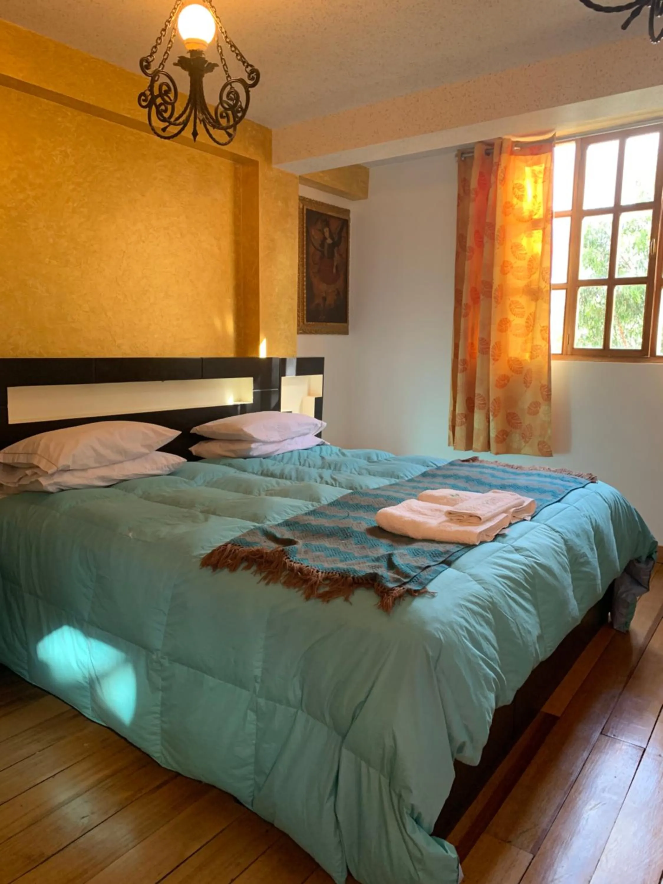 Bed in Hostal Qolqampata