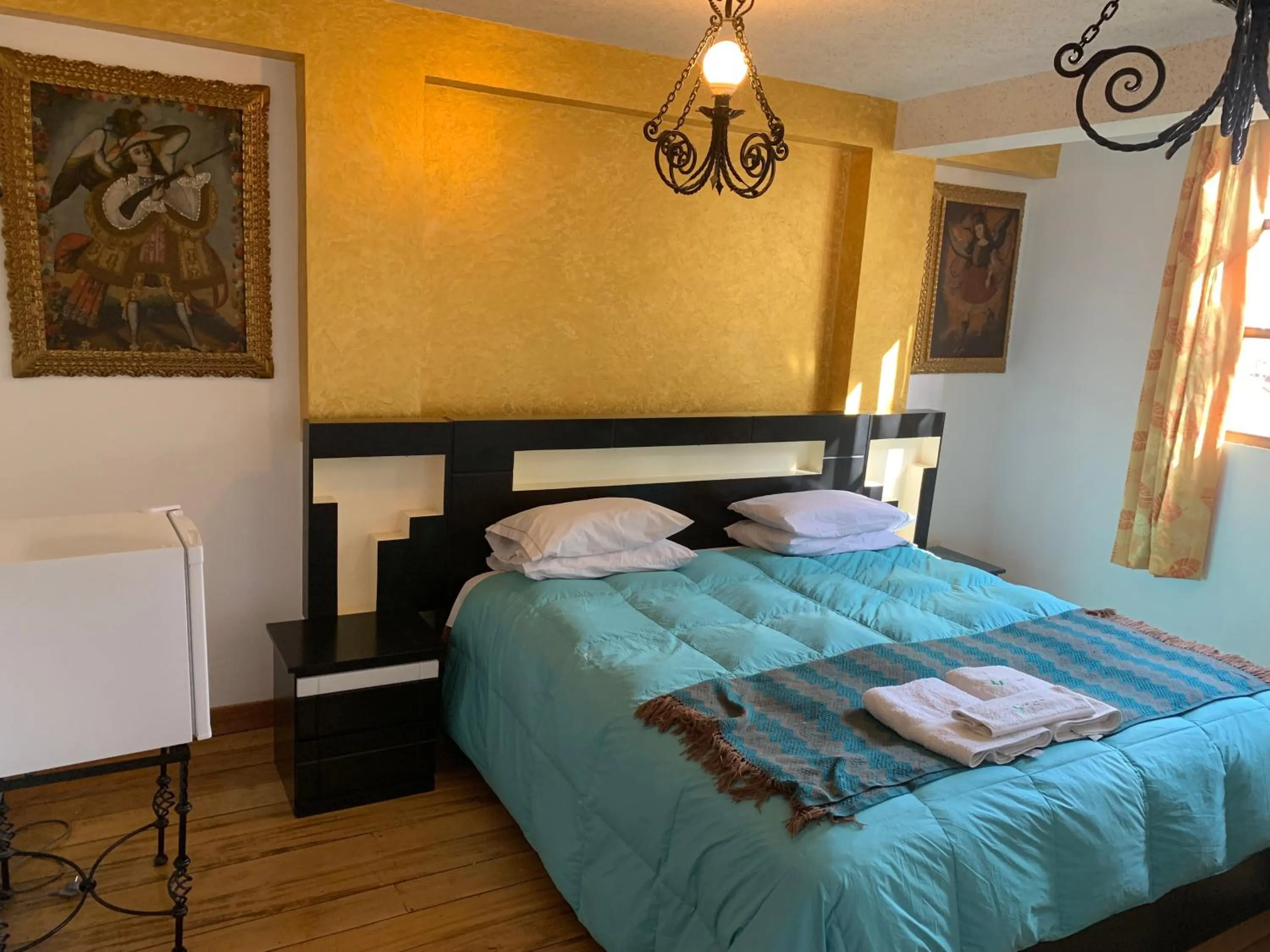 Decorative detail, Bed in Hostal Qolqampata