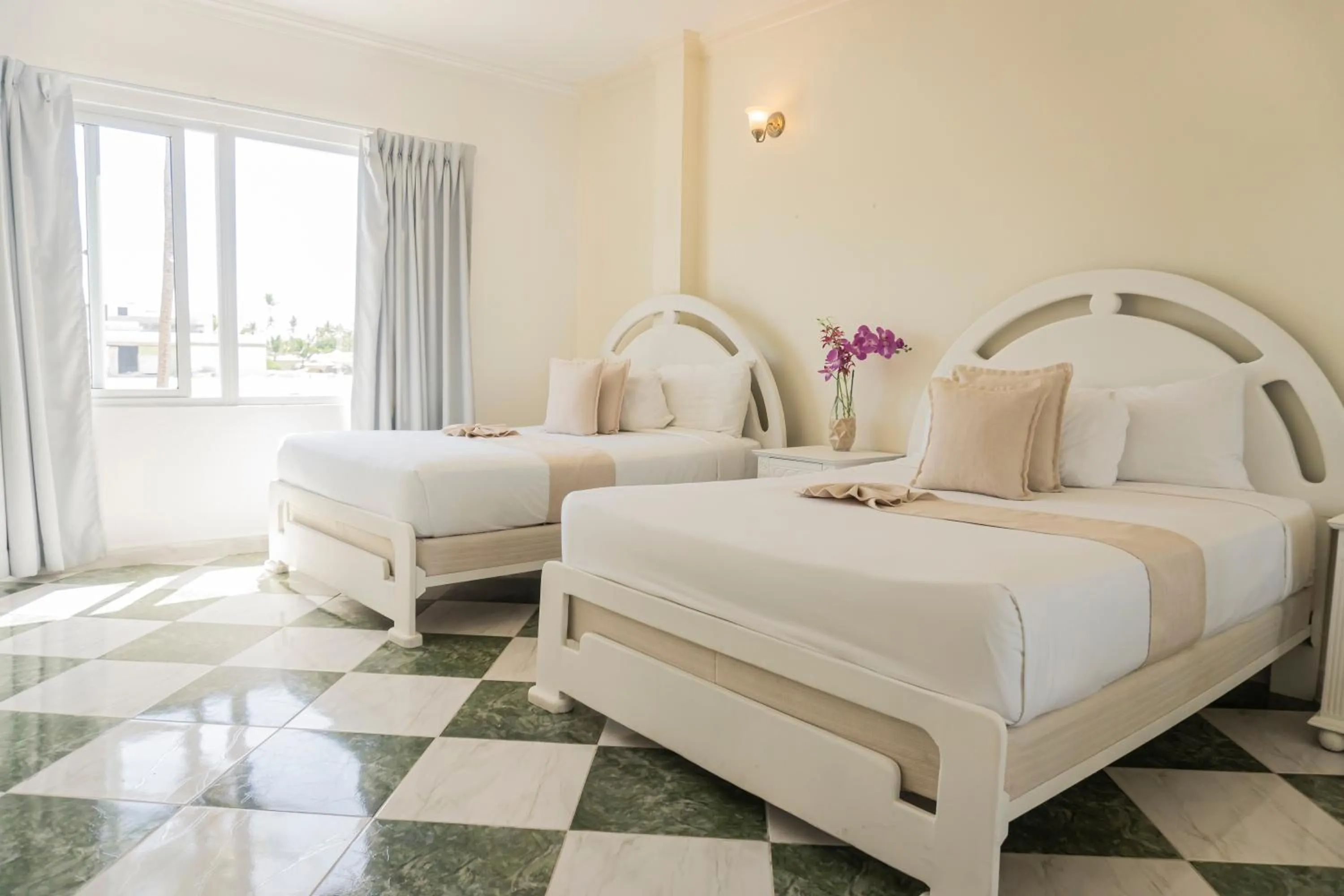 Bed in Hotel Checkin El Cortecito