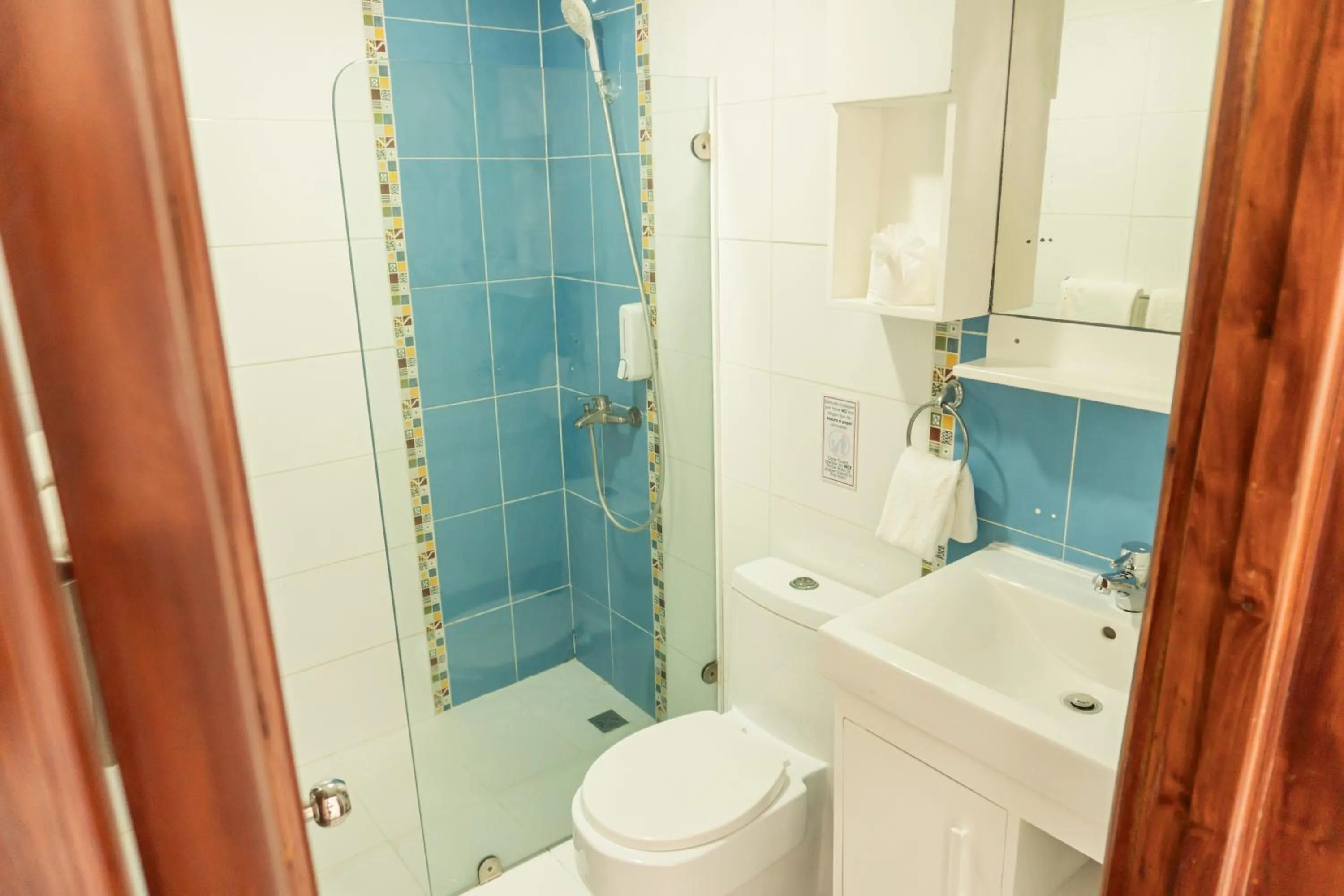 Shower in Hotel Checkin El Cortecito