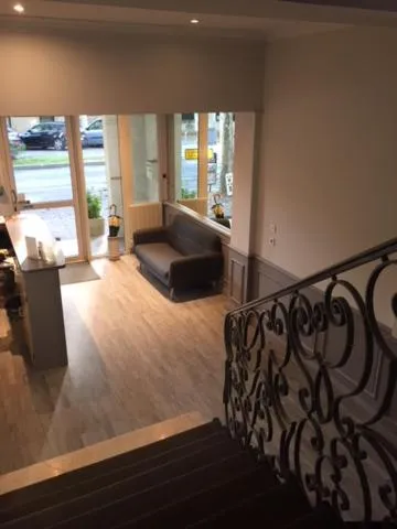 Bed in Logis Hotel du Midi