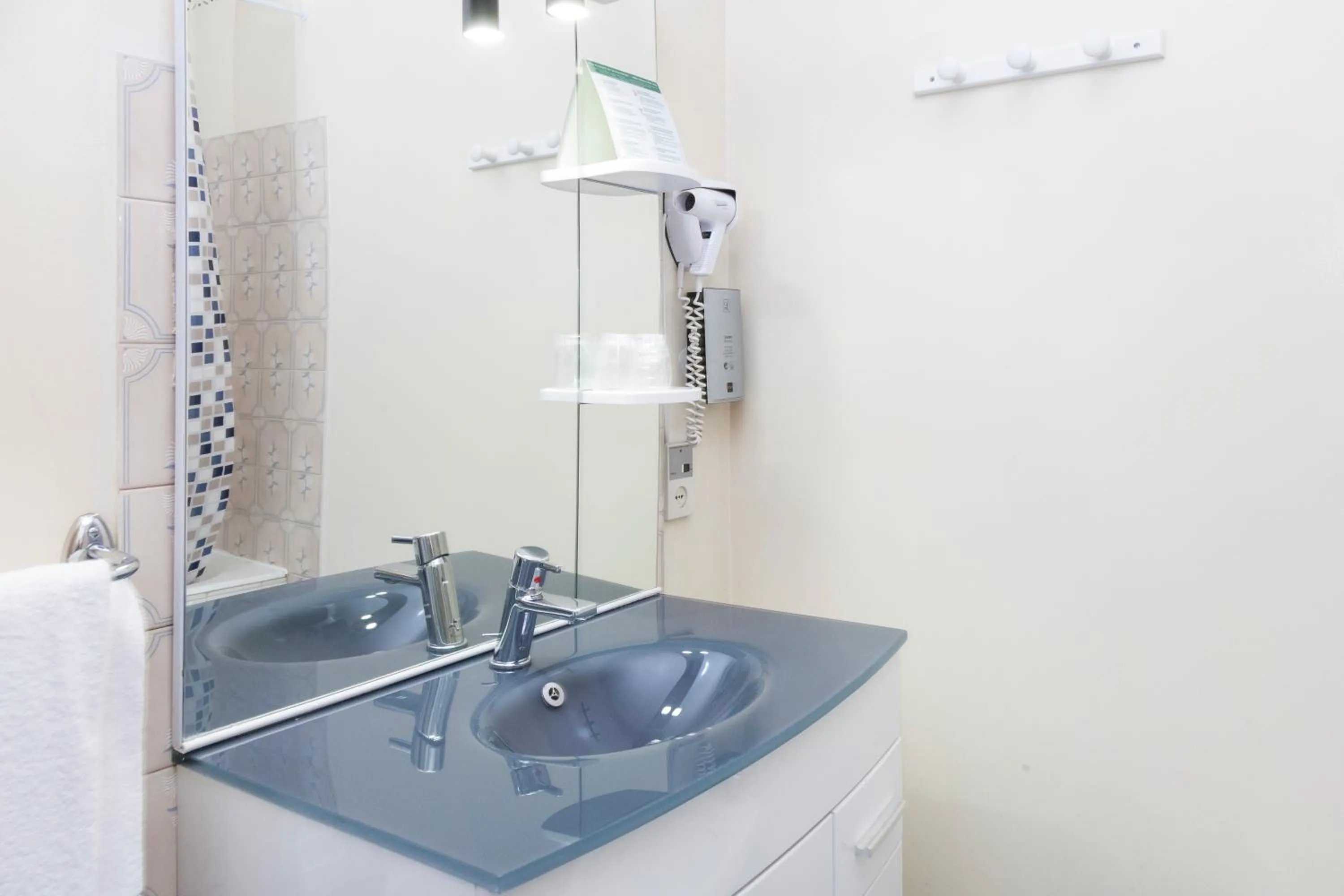 Bathroom in Logis Hotel du Midi