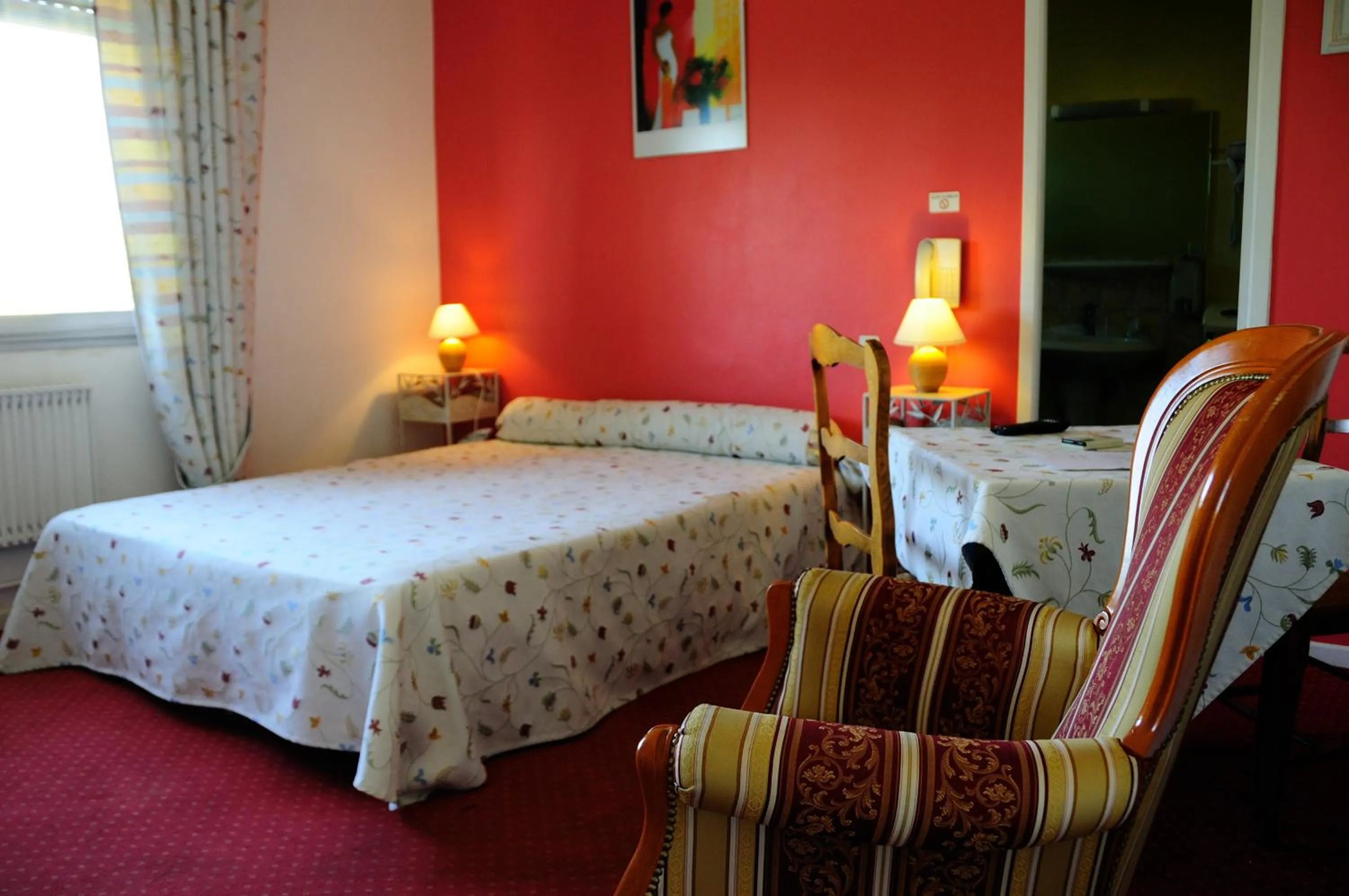 Photo of the whole room, Bed in Logis Hotel du Midi
