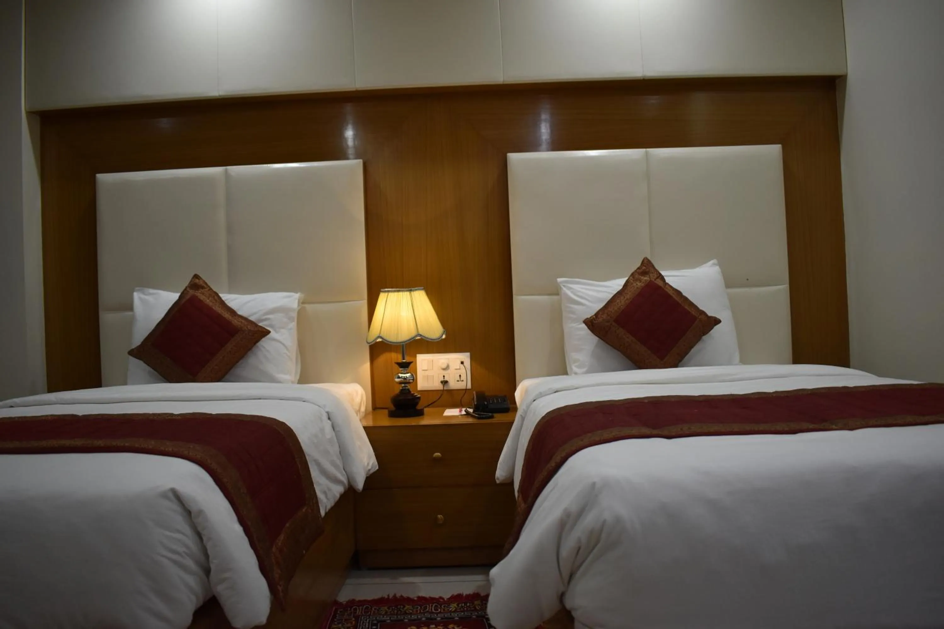 Bed in HOTEL ANAND INTERNATIONAL