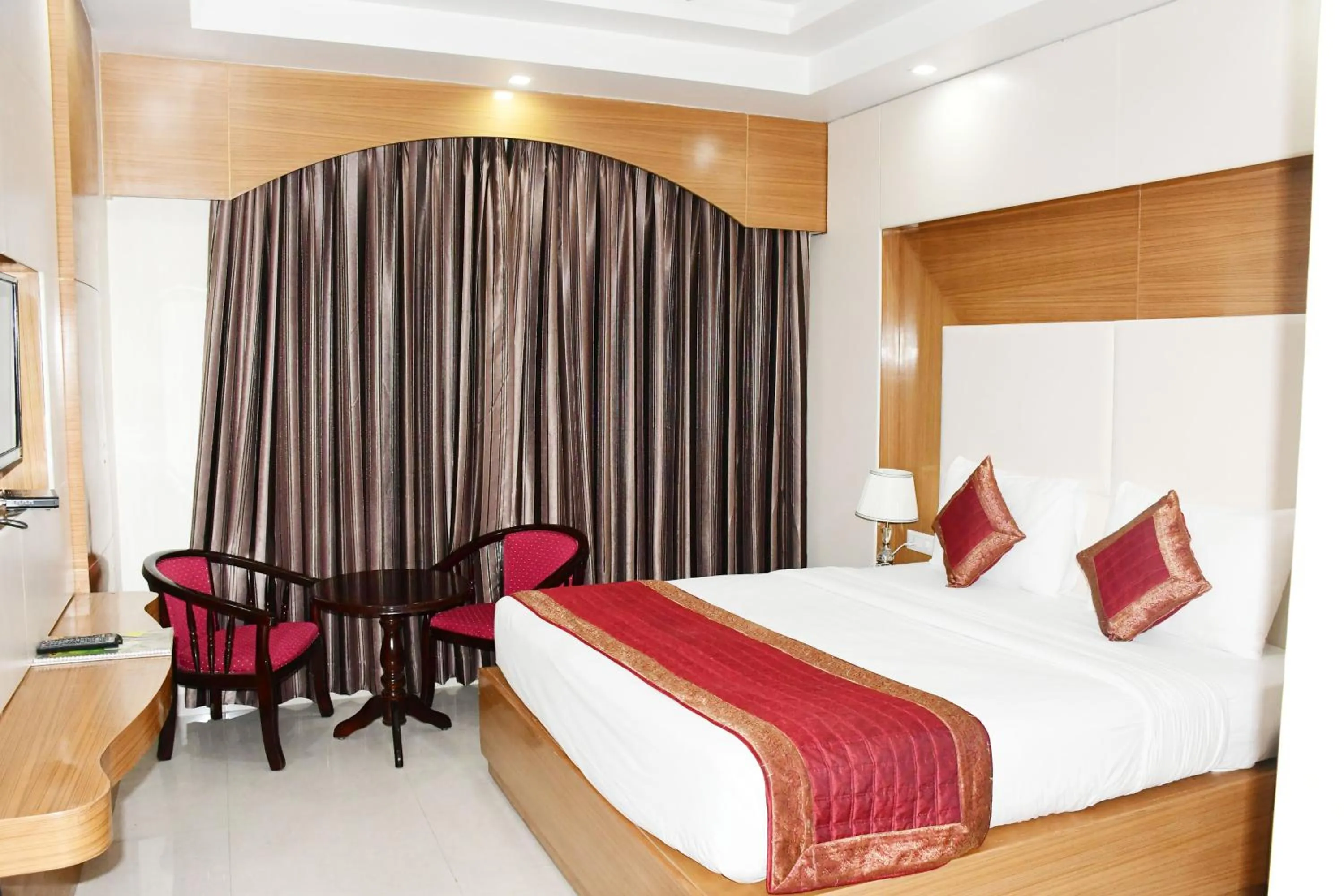 Bed in HOTEL ANAND INTERNATIONAL