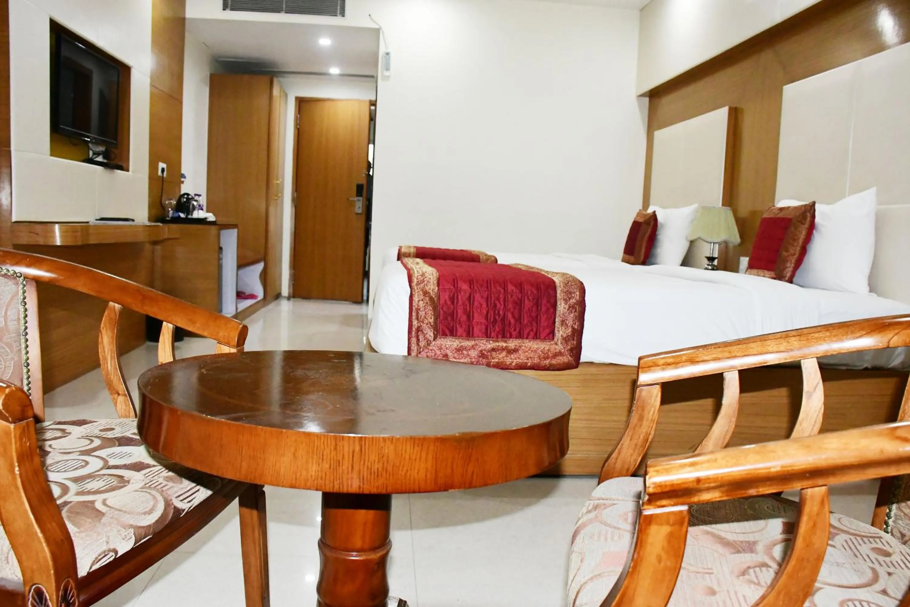 Bed in HOTEL ANAND INTERNATIONAL