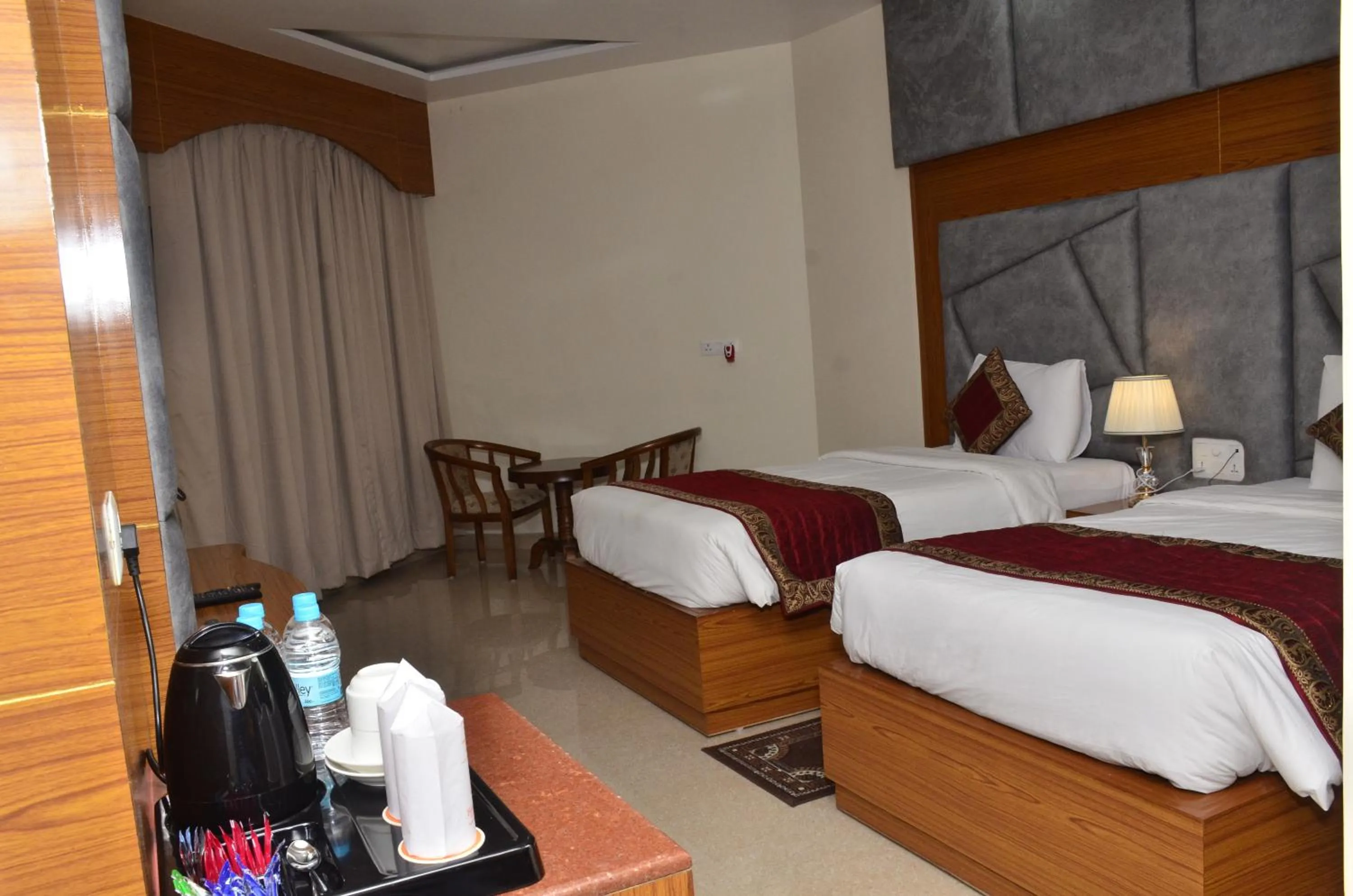 Bed in HOTEL ANAND INTERNATIONAL