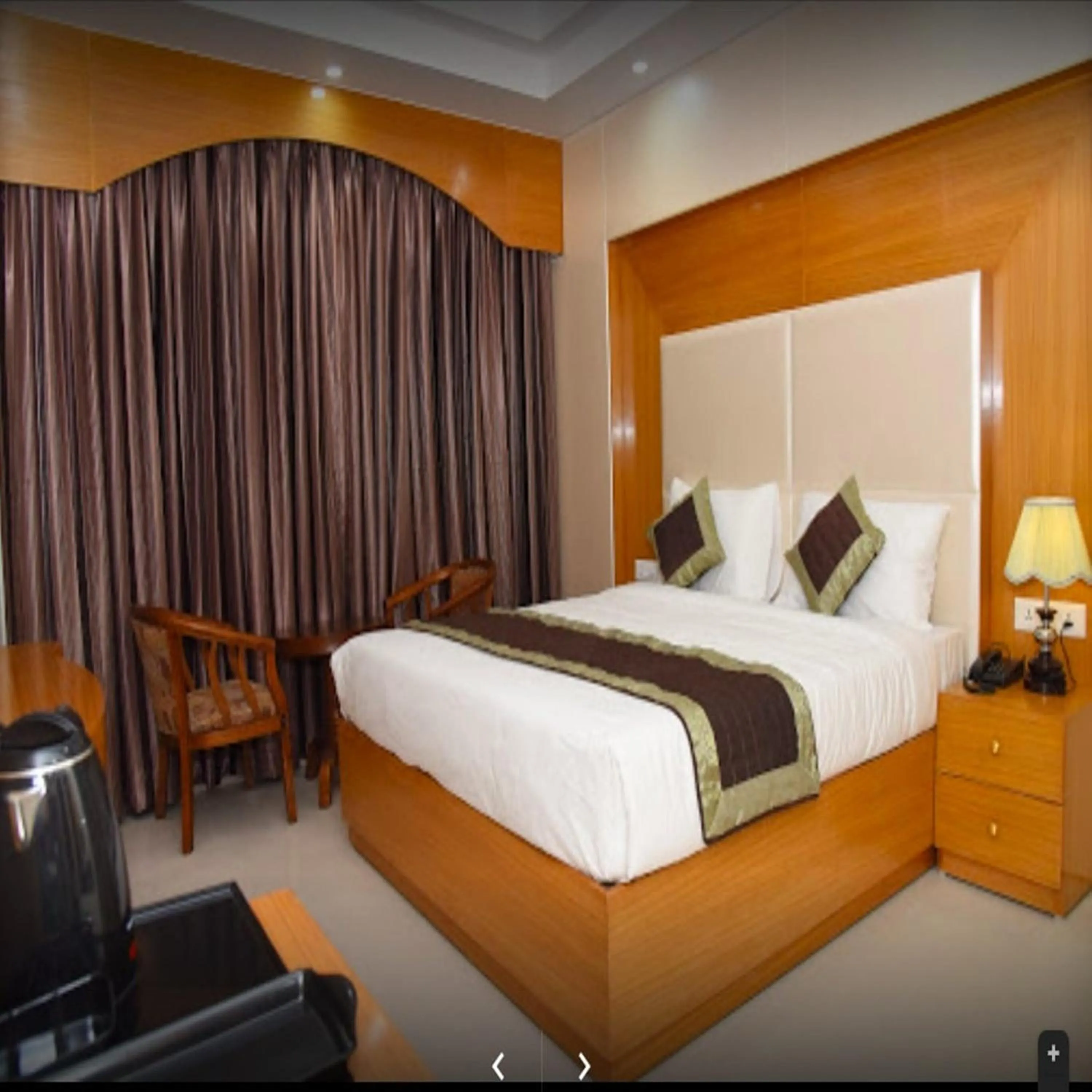 Bed in HOTEL ANAND INTERNATIONAL