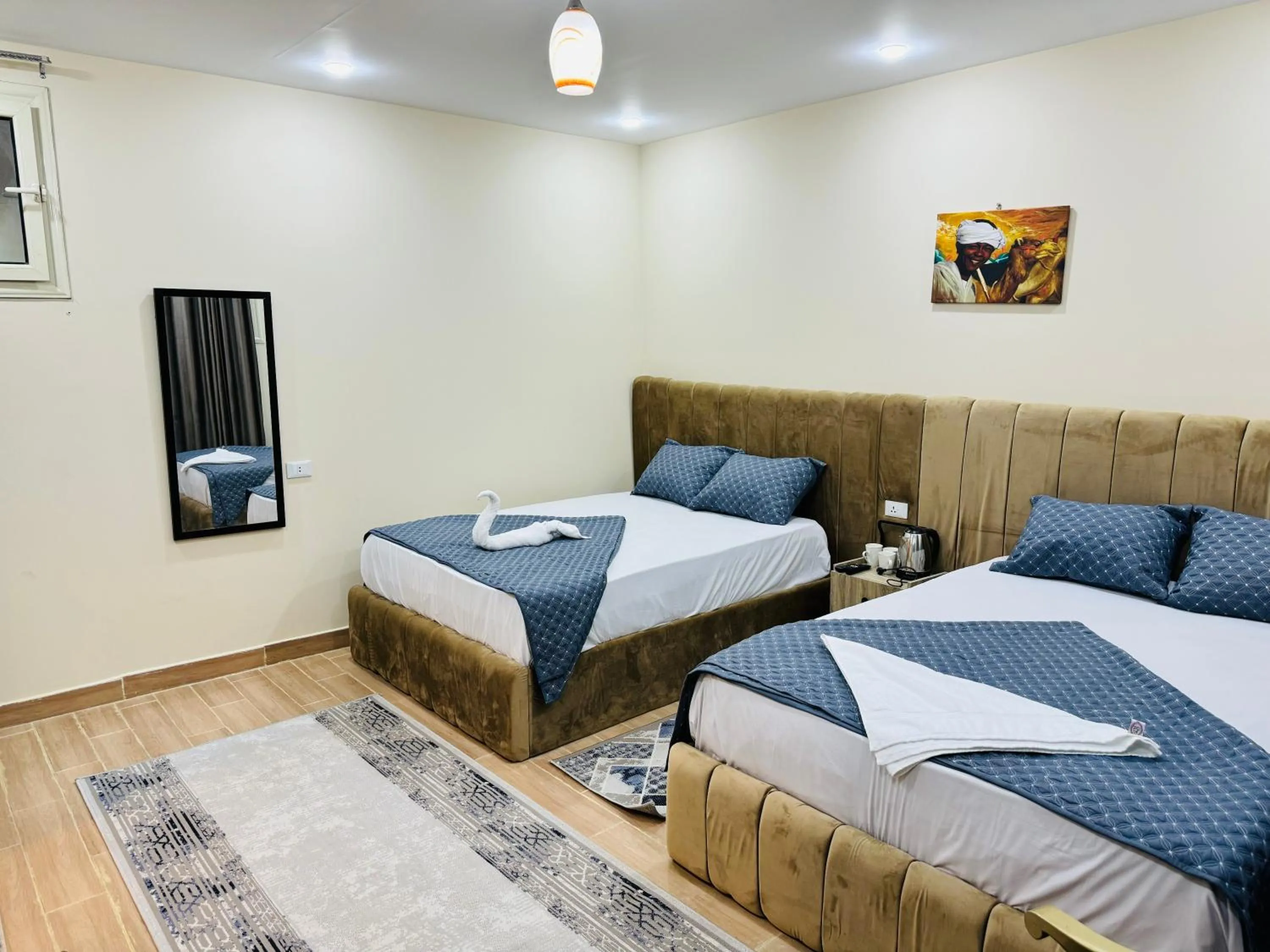 Bed in Sphinx palace pyramids view inn