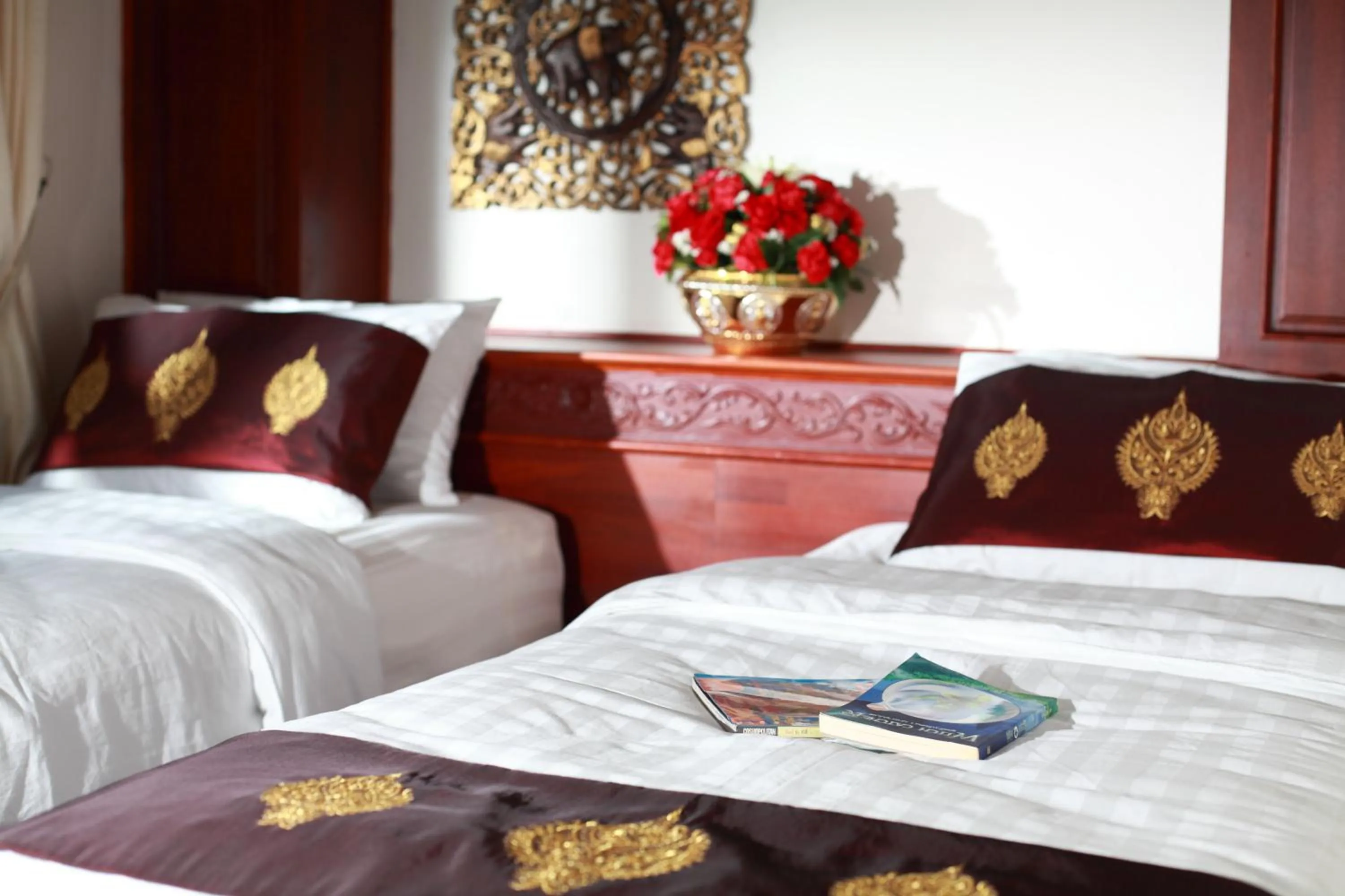Bed in Manorom Boutique Hotel