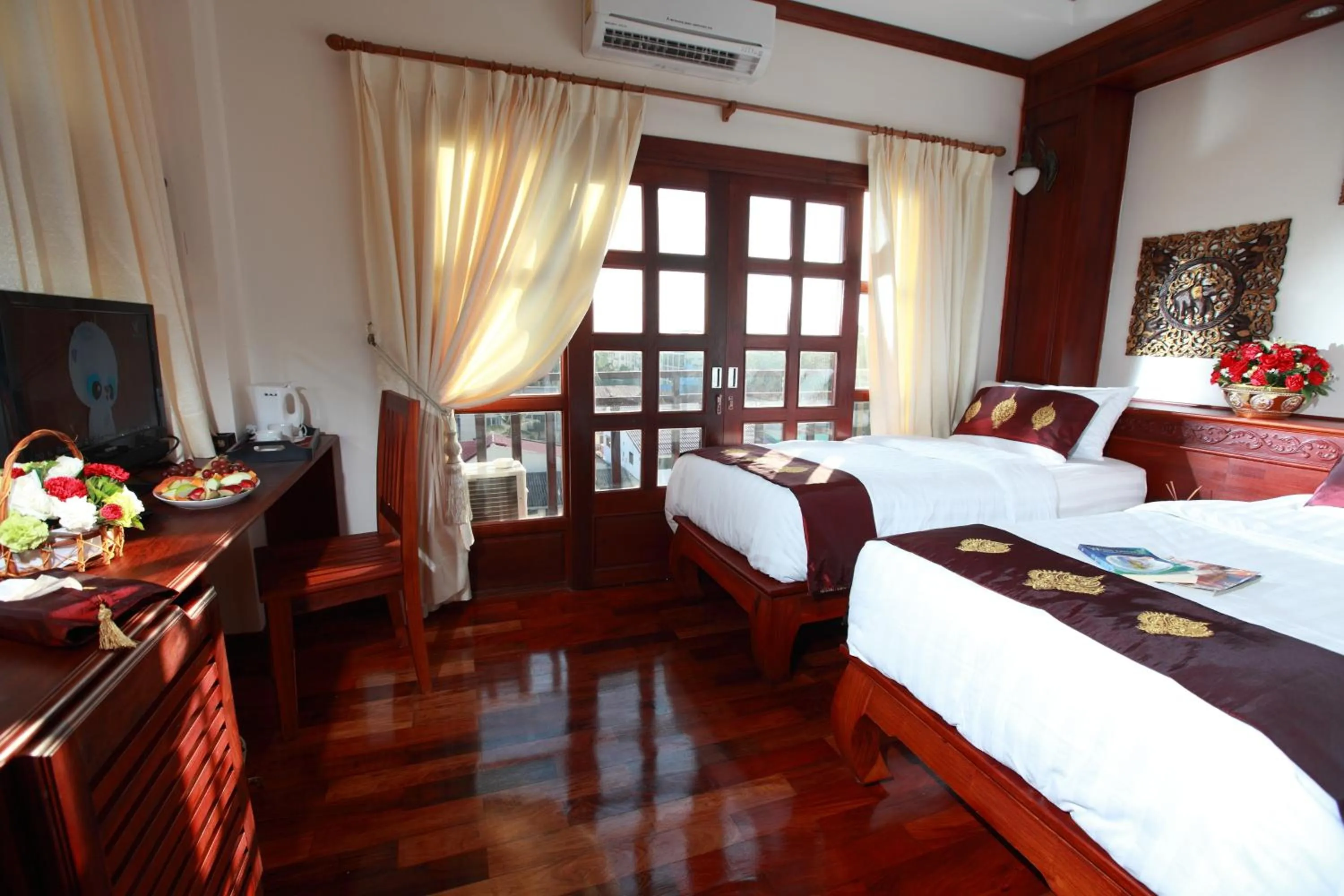 Bed in Manorom Boutique Hotel