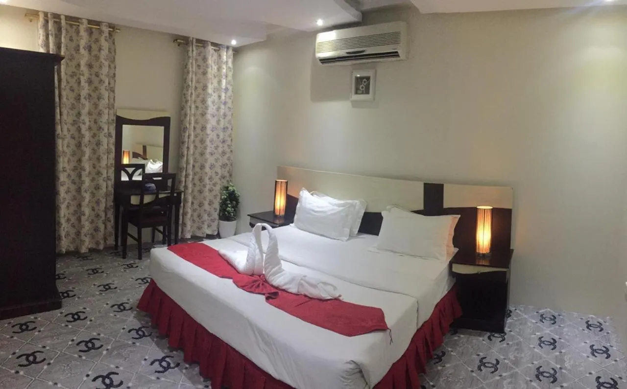 Bed in Merfal Hotel Apartments Al Taawan