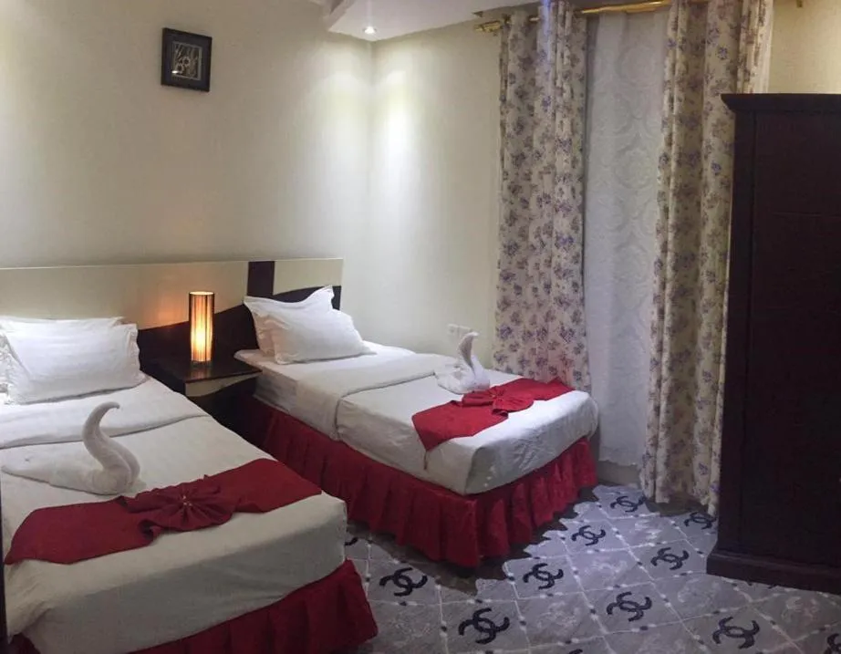 Bed in Merfal Hotel Apartments Al Taawan