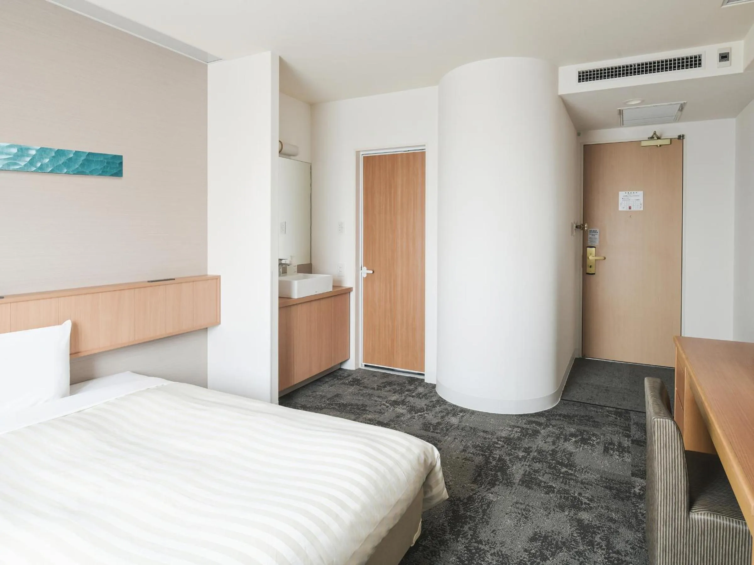 Bed in Vessel Hotel Ishigakijima