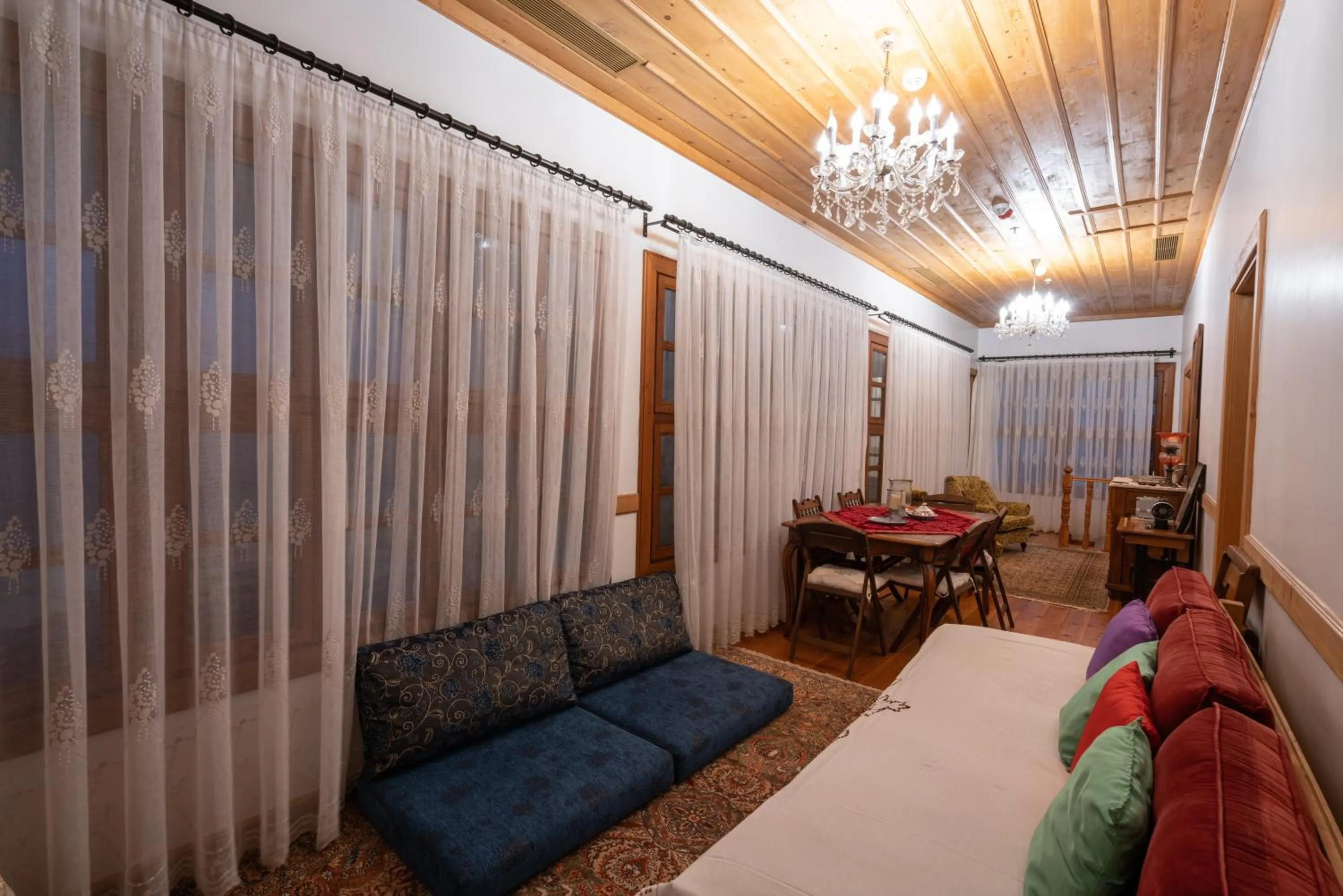 Seating area, Bed in Cedrus Hotel