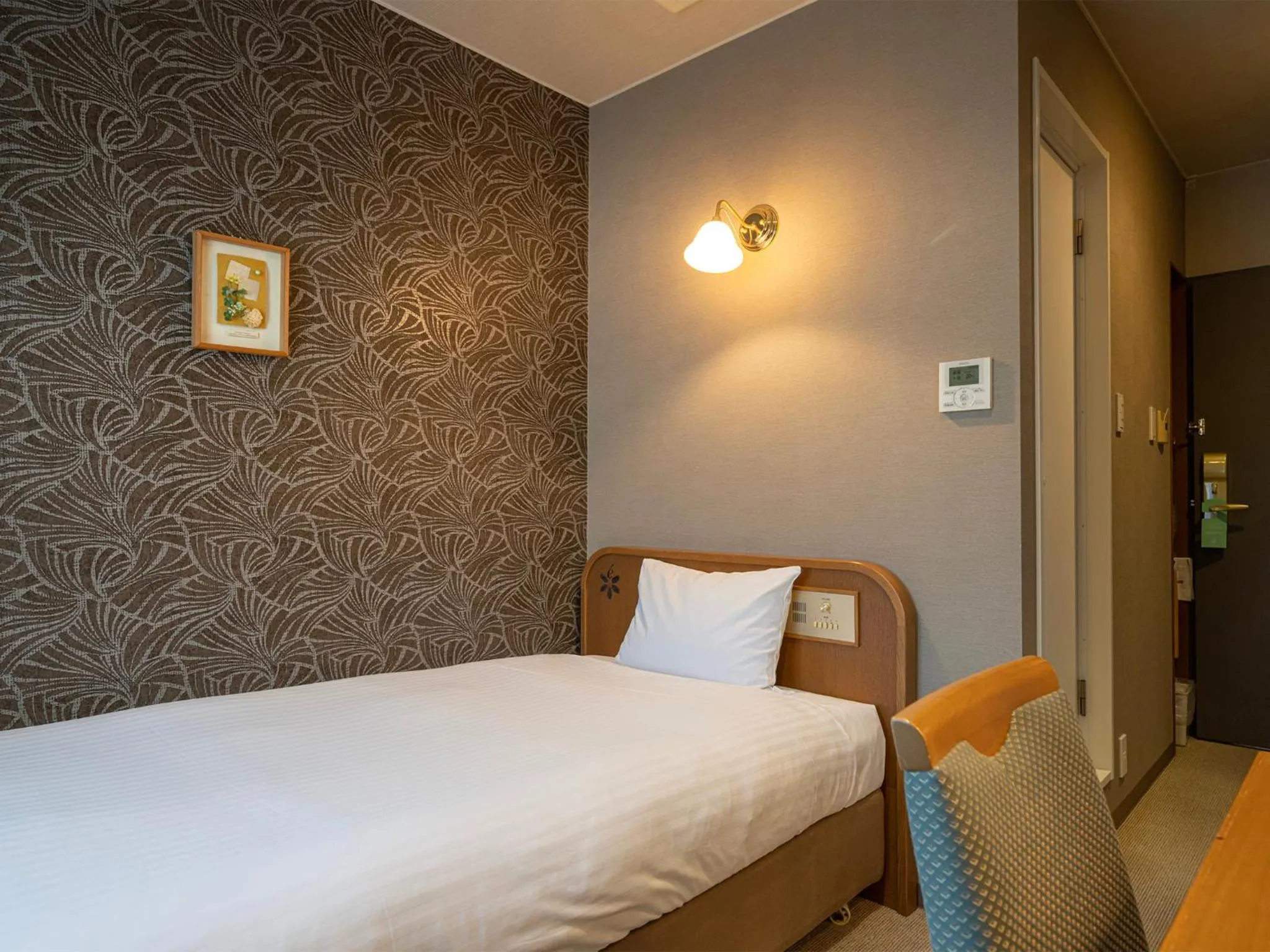 Bed in Hotel Eclair Hakata