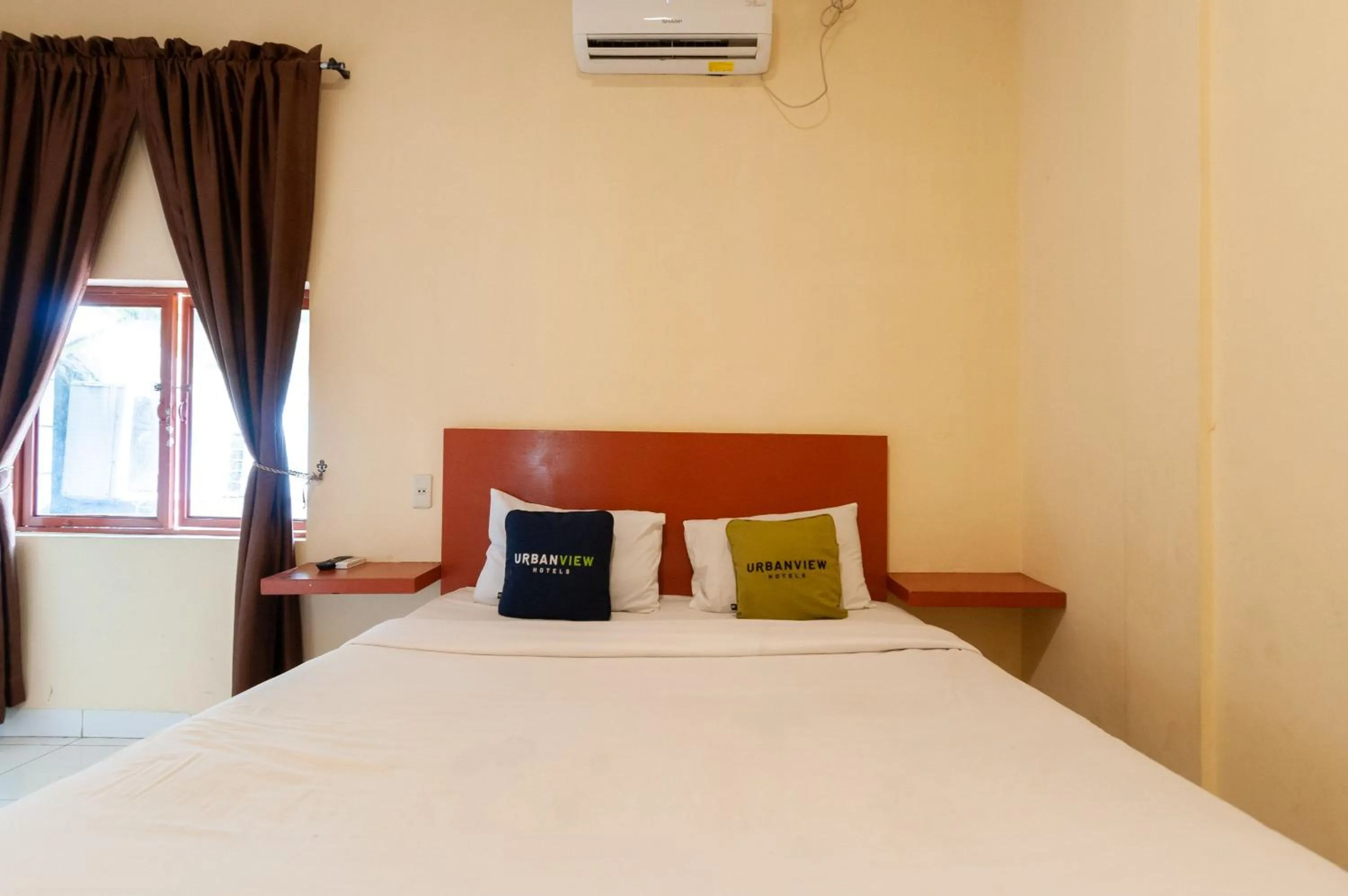 Bedroom in Urbanview Hotel Syariah Residence Medan by RedDoorz