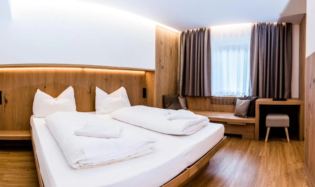 Bed in Hotel Des Alpes