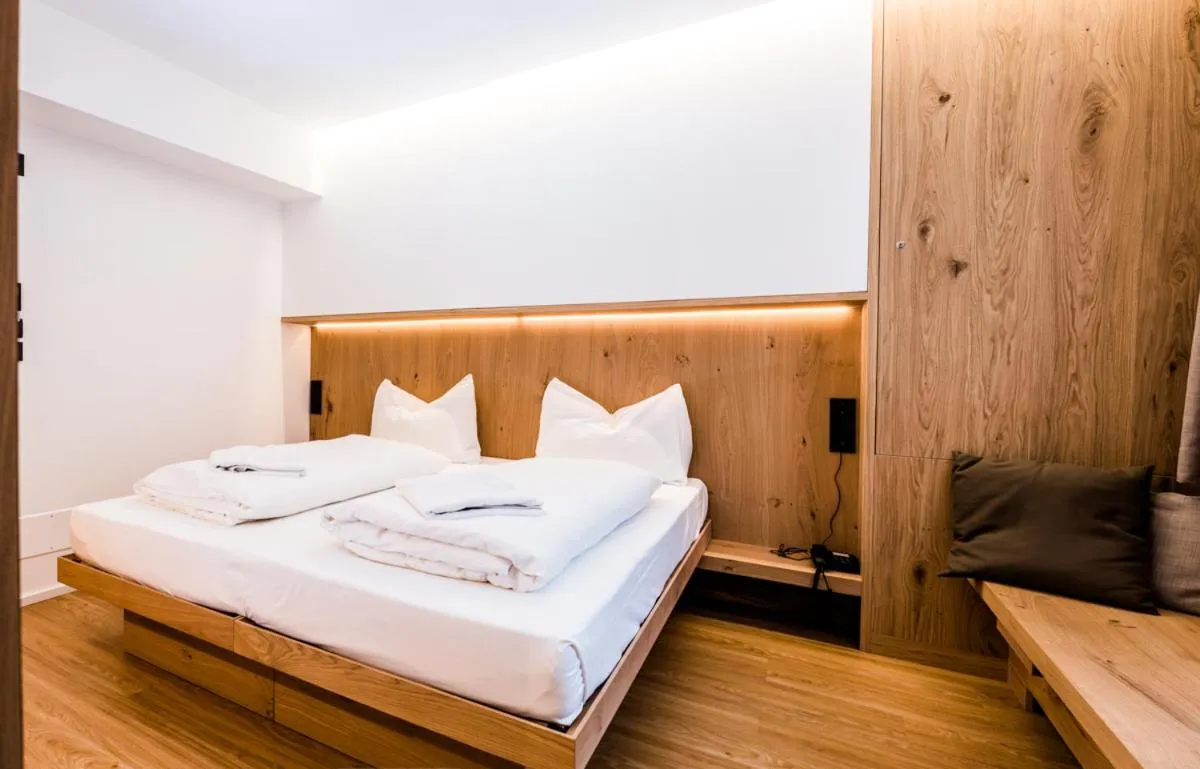 Bed in Hotel Des Alpes