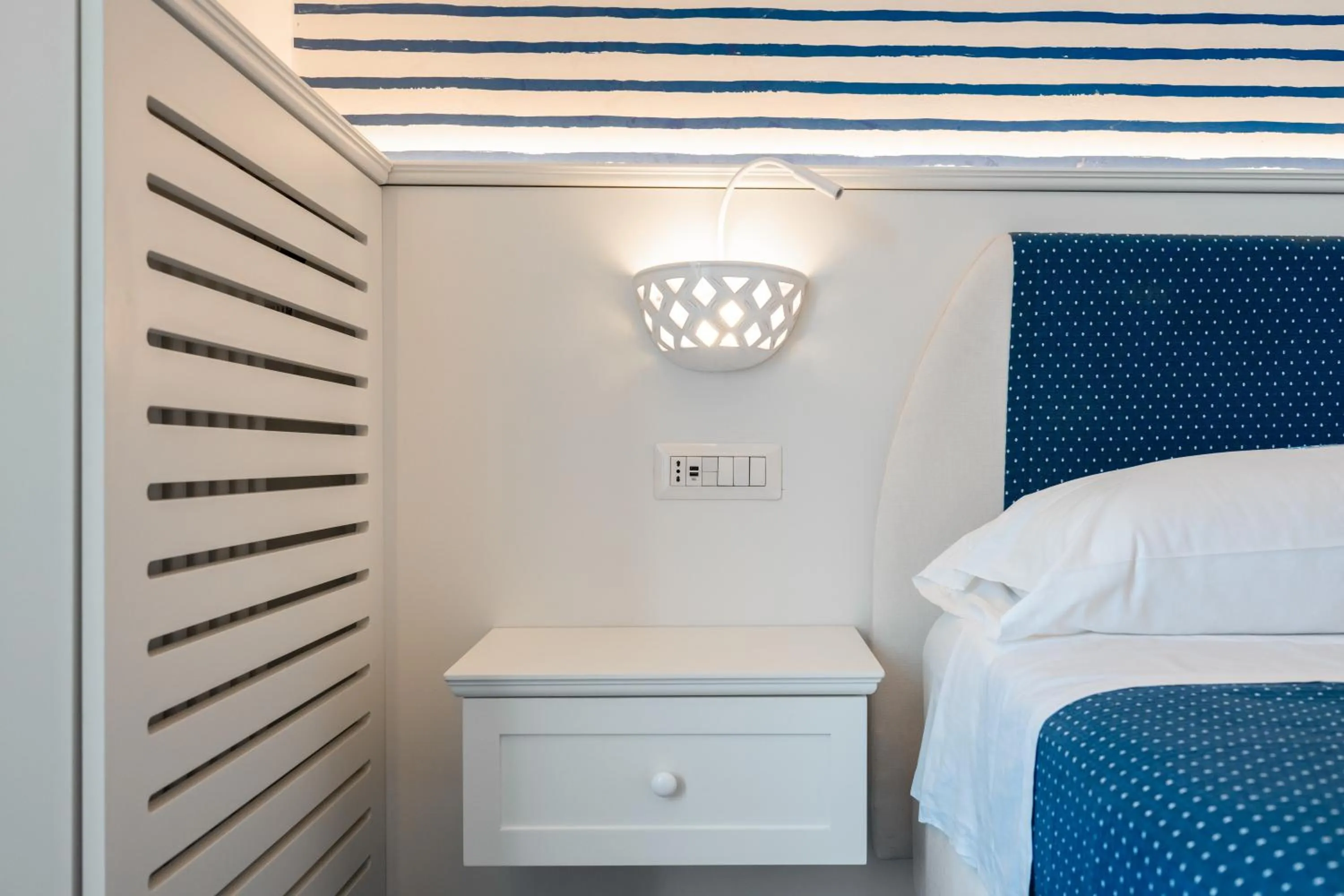 fireplace, Bed in Hotel Calanca