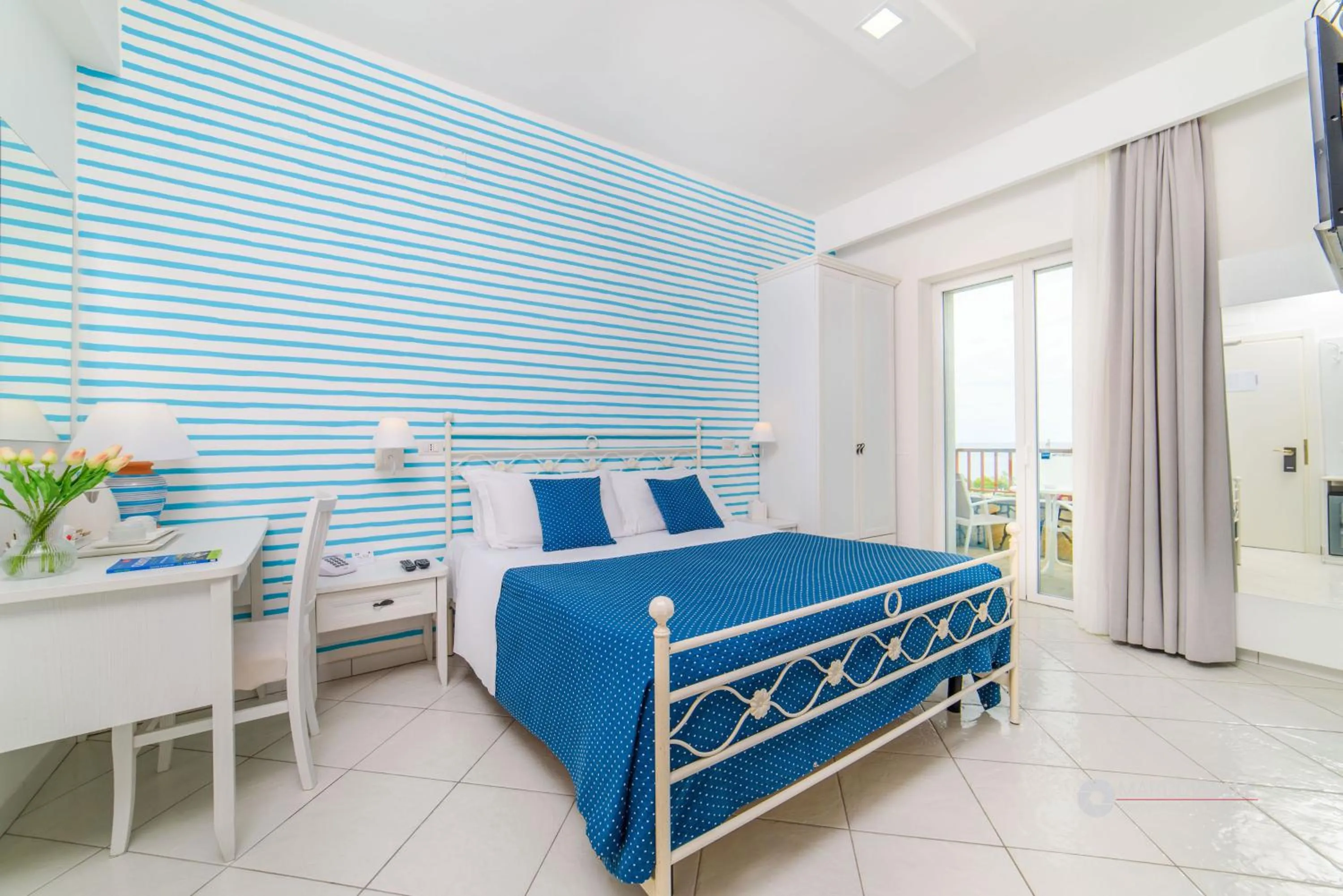 Bed in Hotel Calanca