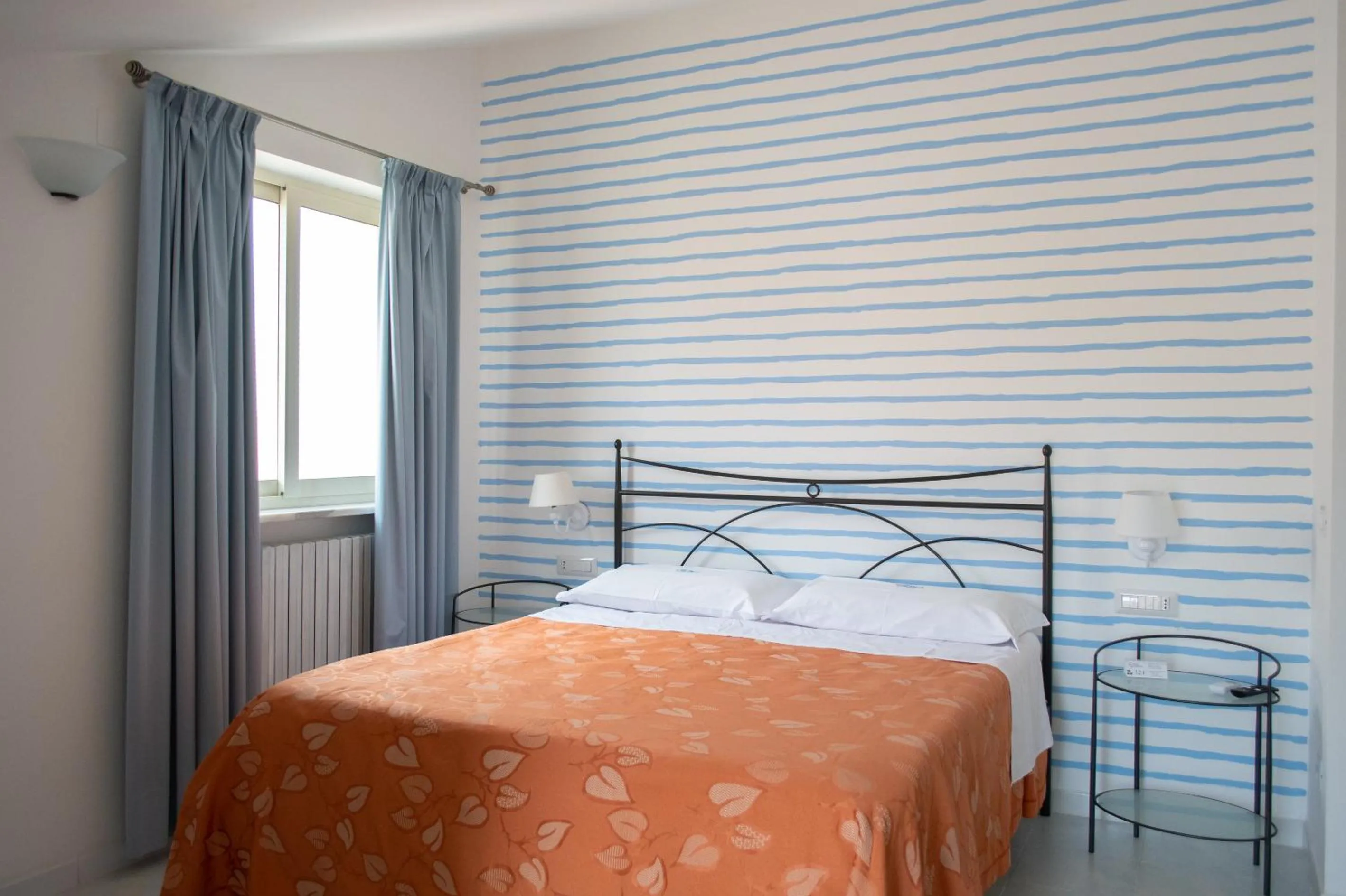 Bed in Hotel Calanca