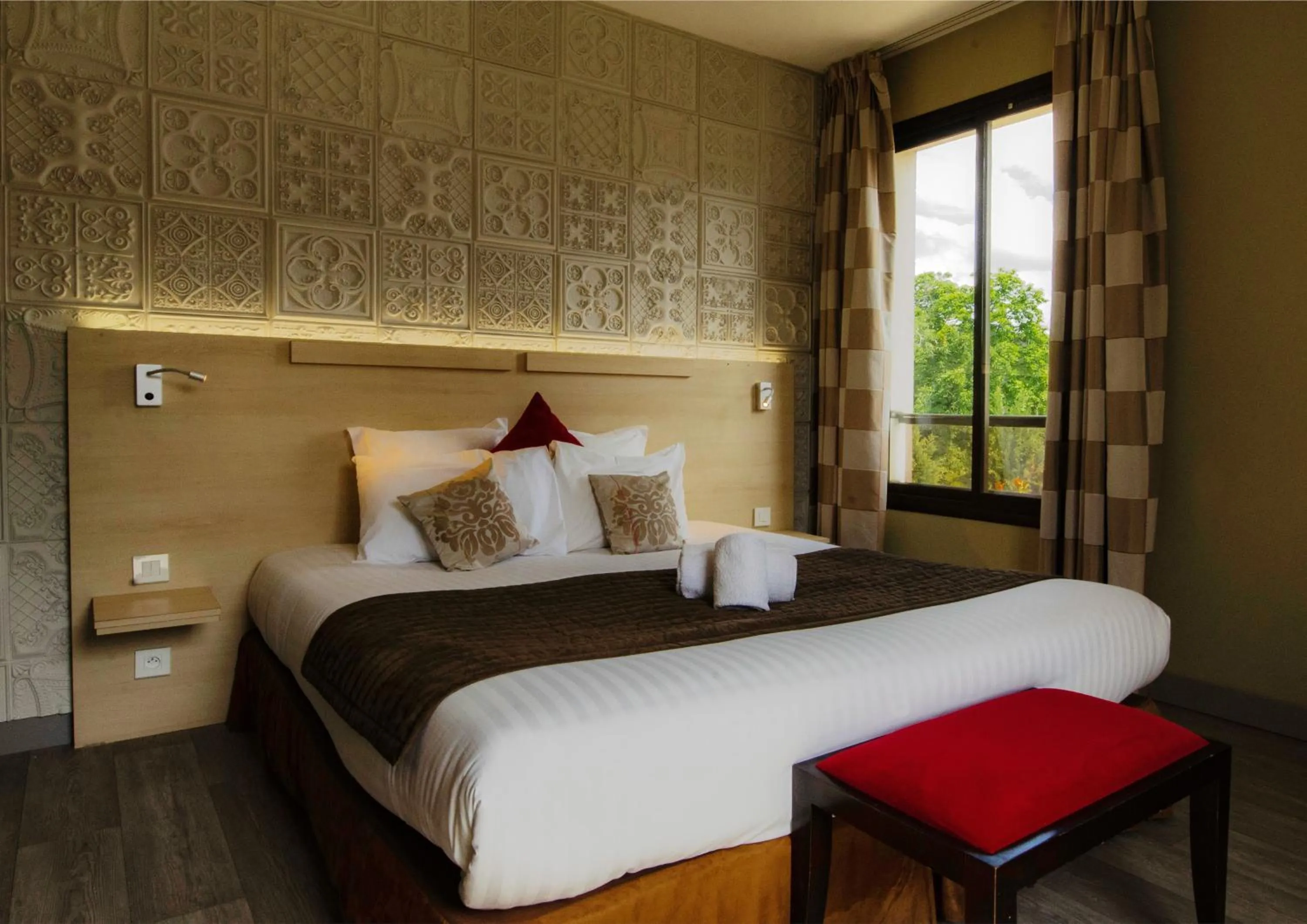 Bed in Au Grand Hôtel de Sarlat - Pavillon de SELVES