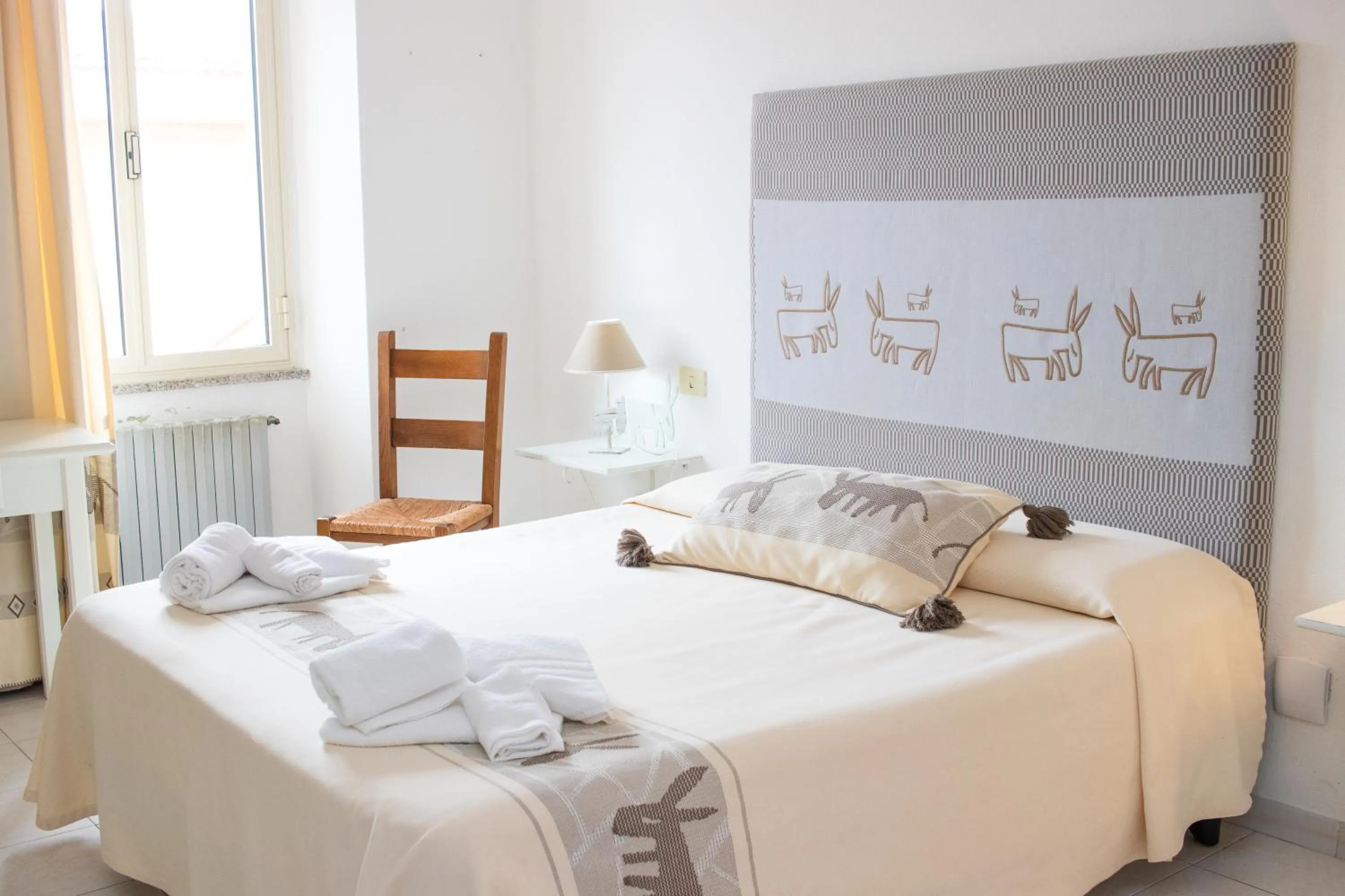 Bed in Hotel Canne al Vento