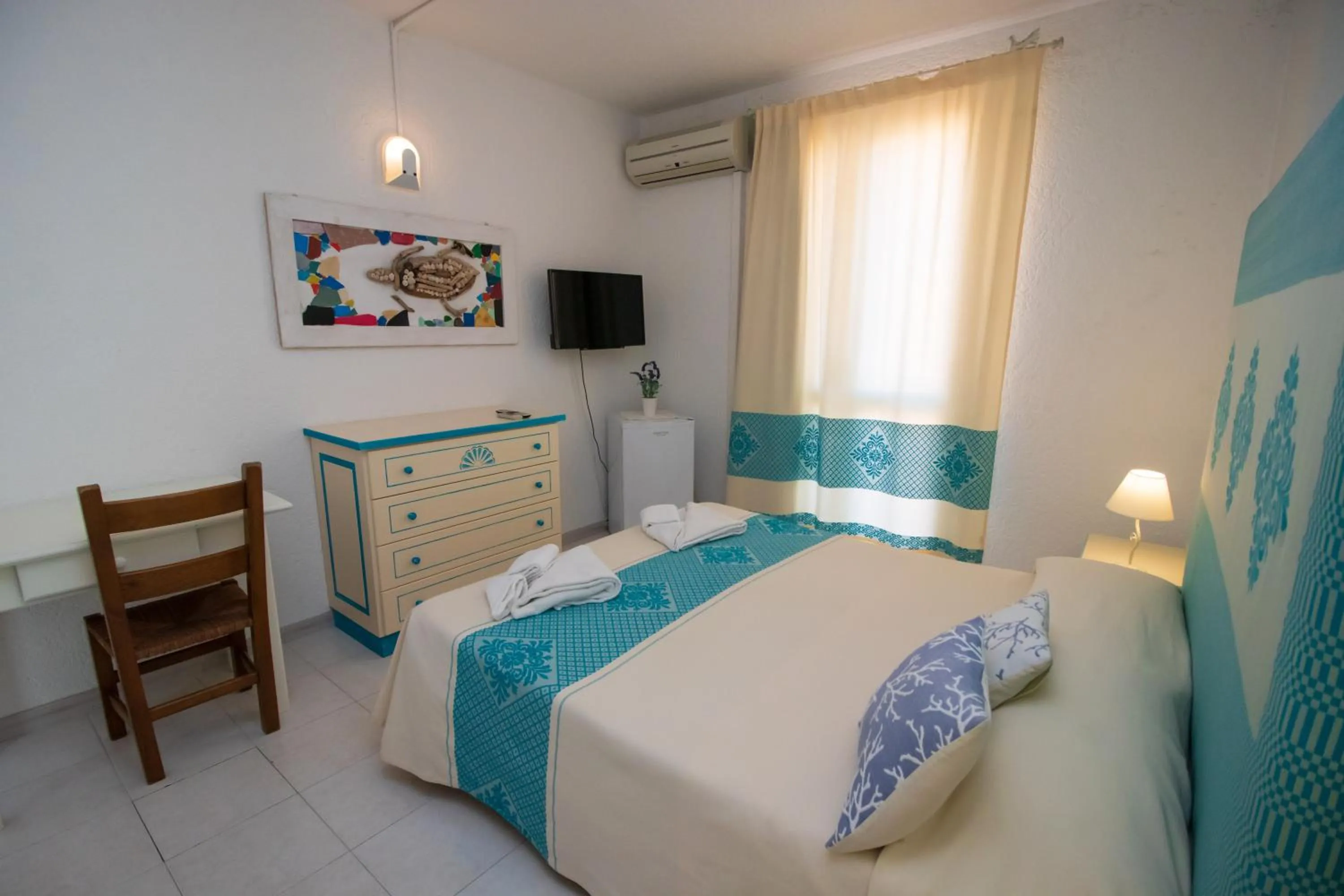 Bed in Hotel Canne al Vento